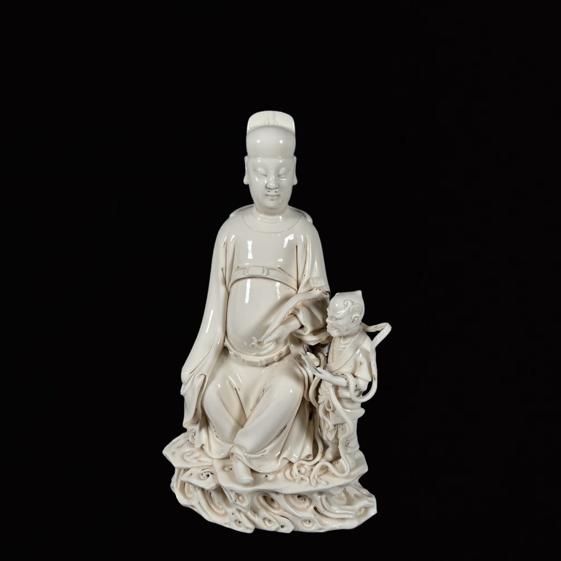 A Solemn Blance-De-Chine Statue of Figure (1 of 8)