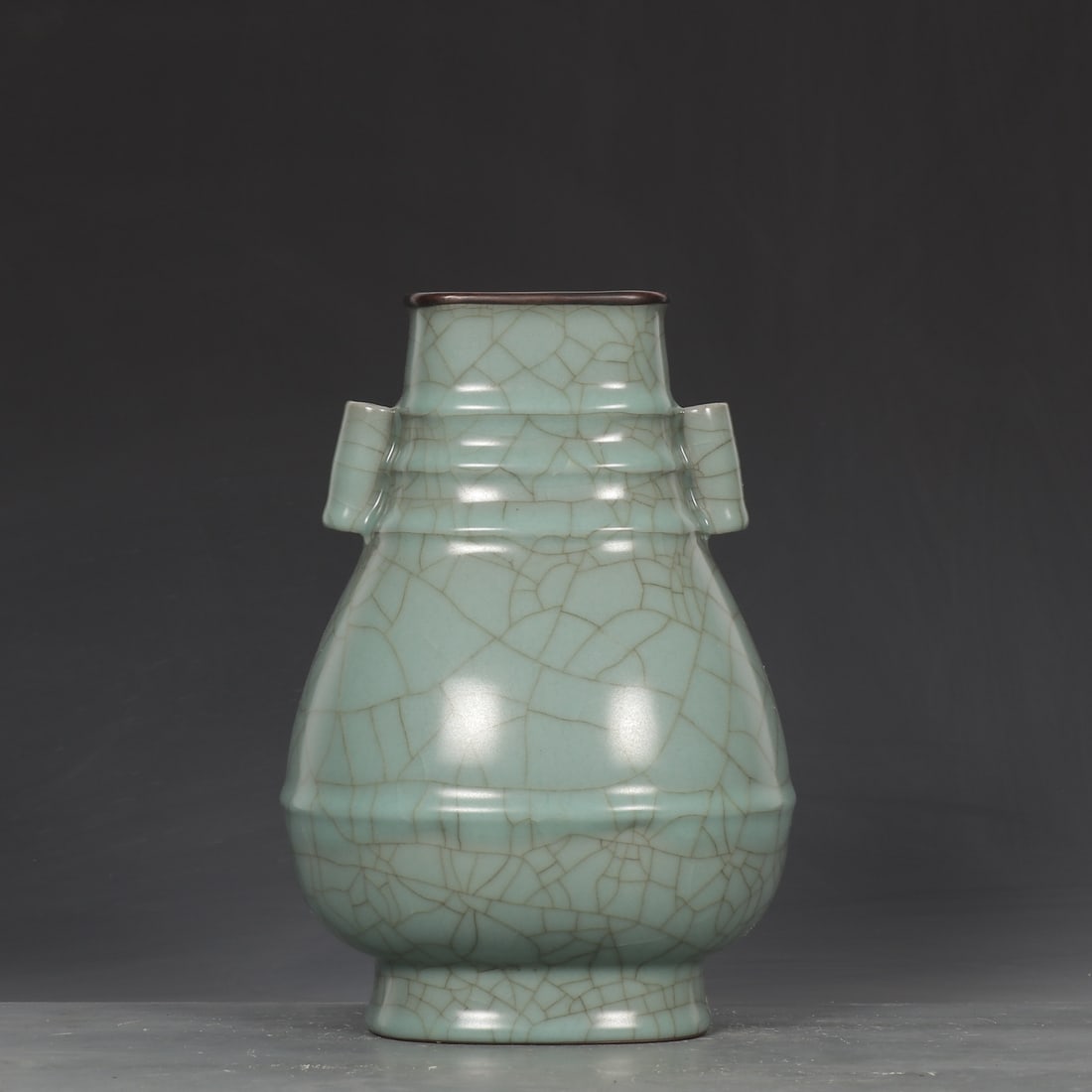 An Exquisite Guan yao Celadon Glazed Cover with Silver Double-Ears Vase,with an Imperial Poem by: An Exquisite Guan yao Celadon Glazed Cover with Silver Double-Ears Vase,with an Imperial Poem by Emperor Qianlong,Song Dynasty,China,Size:9.3inx6.3in 官窑青釉银口&#