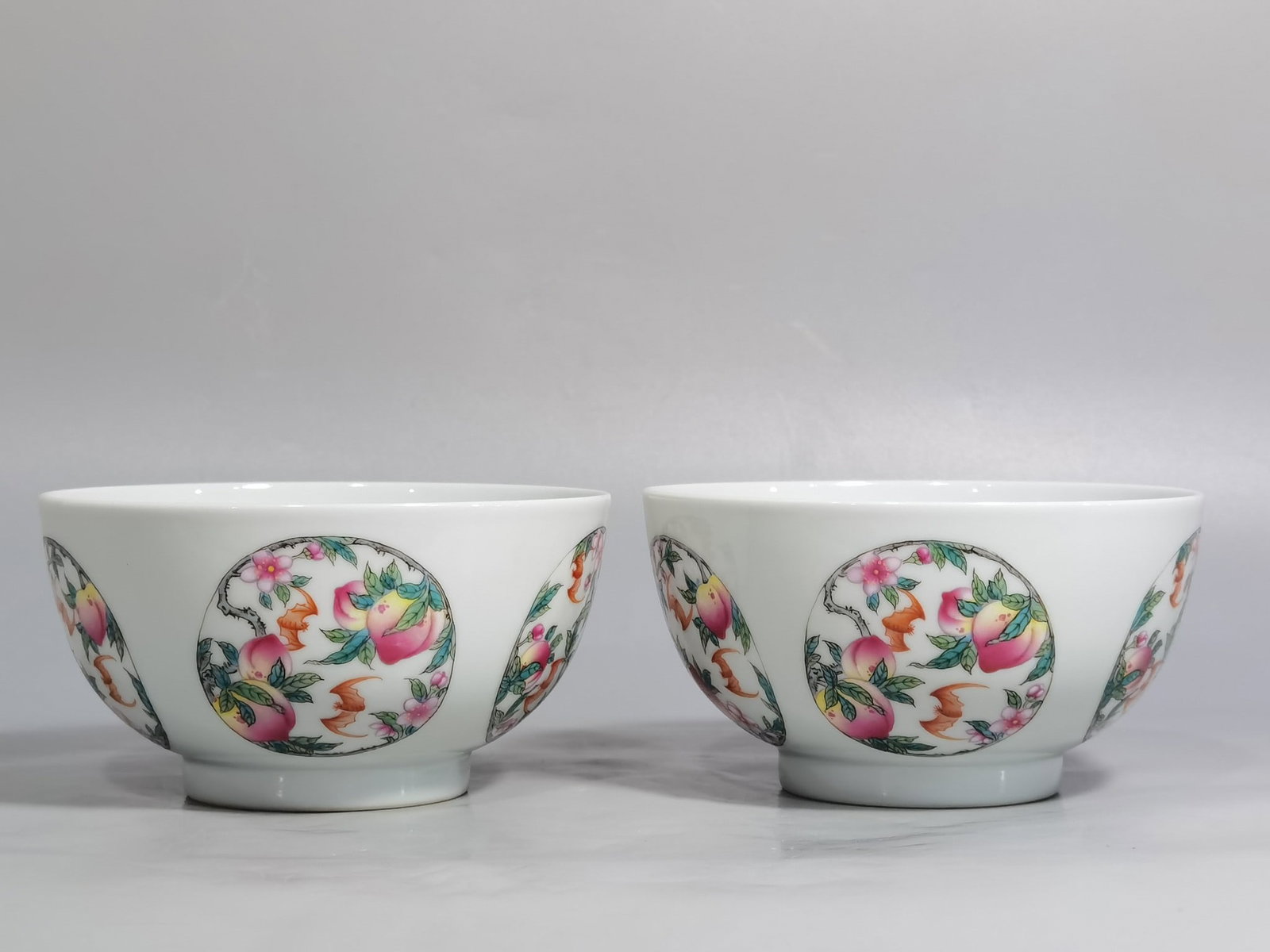A Pair of Exquisite Bats and Peach Pattern Bowls: A Pair of Exquisite Bats and Peach Pattern Bowls,Qing Dynasty,China,Yongzheng Six-character Mark,Size:4.6inx2.4in 