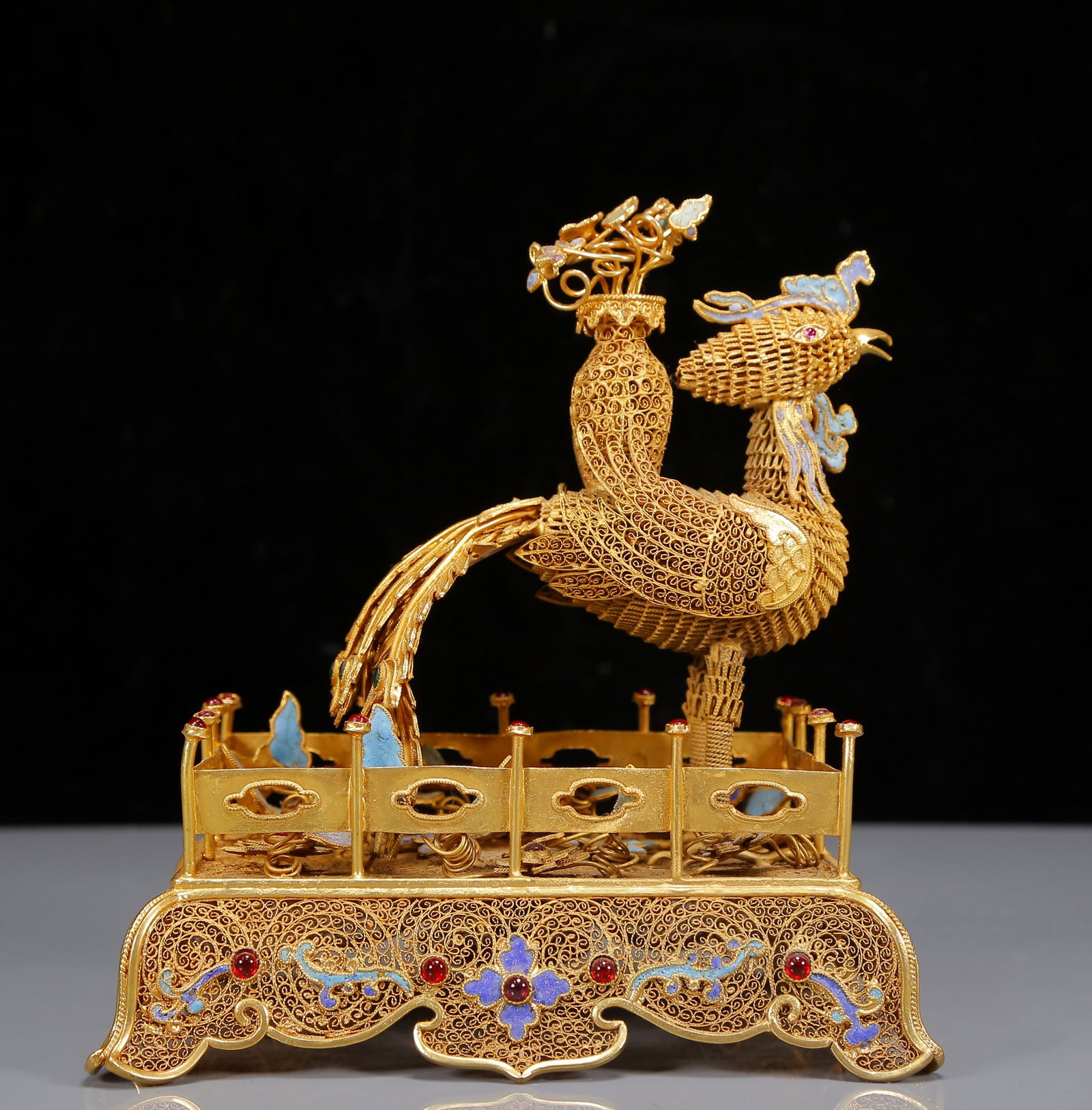 An Exquisite Gilt Inlaid Gems Phoenix Ornament: An Exquisite Gilt Inlaid Gems Phoenix Ornament,Qing Dynasty,China,Qianlong Four-character Mark,Size:6.7inx5.5inx8.3in,Weight:610g 