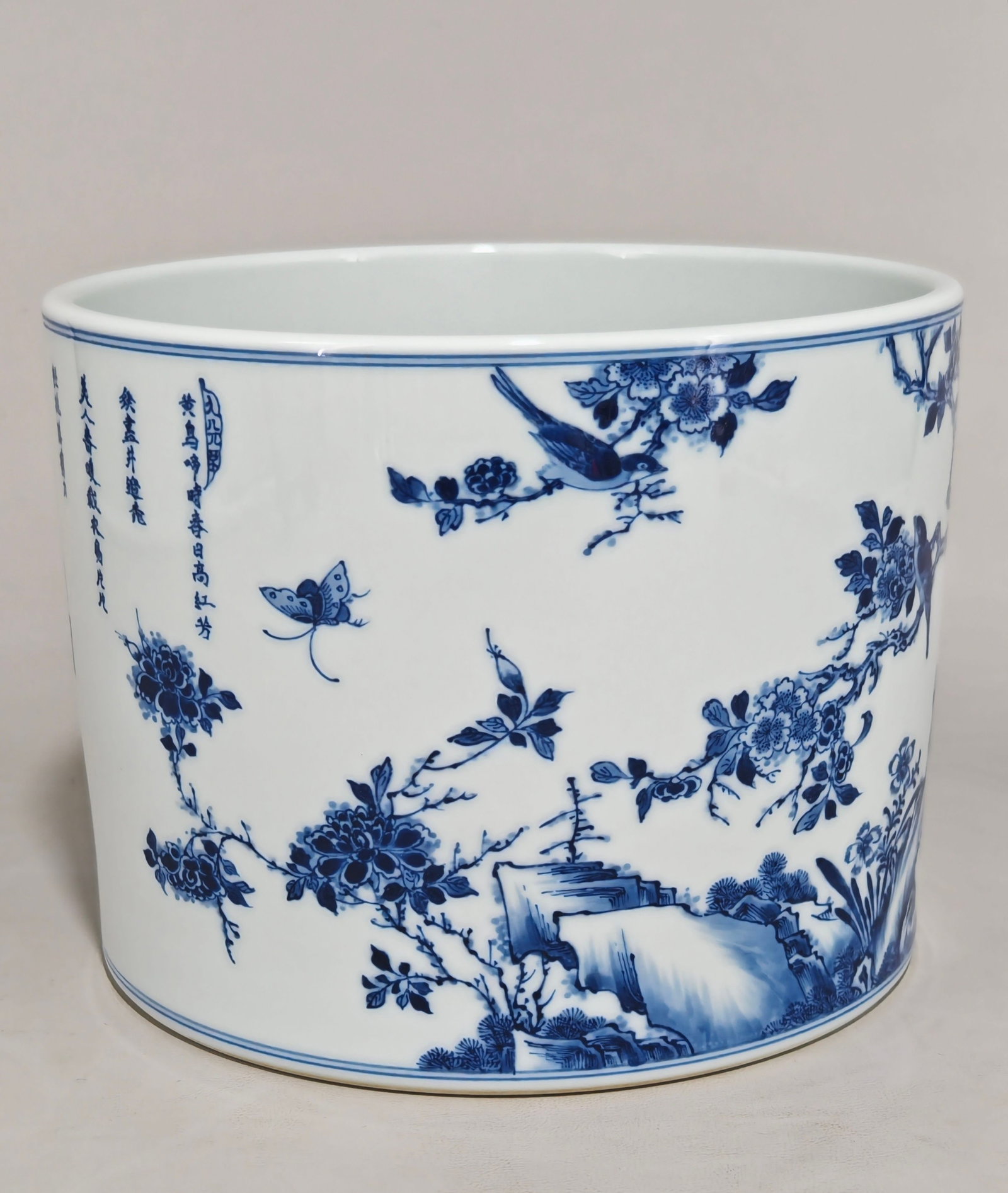 An Exquisite Blue and White Flower and Bird Pattern Brush Pot,with poem: An Exquisite Blue and White Flower and Bird Pattern Brush Pot,with poem,Qing Dynasty,China,Yongzheng Six-character Mark,Size:6inx7.9in 青花花鸟纹笔筒,带