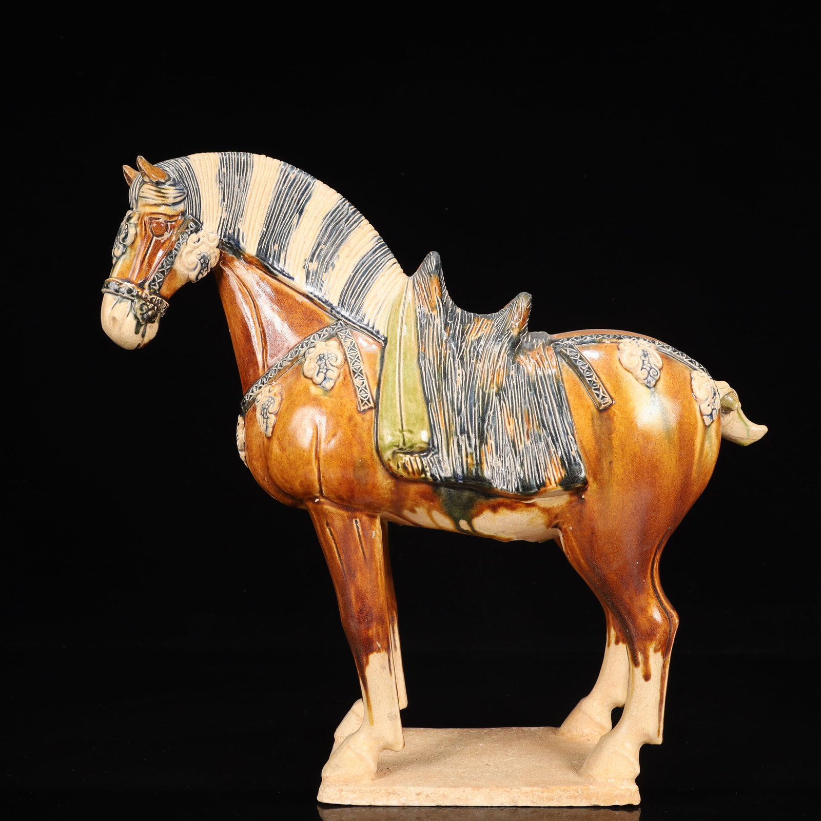 A Rare Tang Tri-Color Glazed Pottery Horse Ornament: A Rare Tang Tri-Color Glazed Pottery Horse Ornament,Tang Dynasty, China,Size:14.6inx4.7inx14.2in,Weight:3150g 唐三彩骏马摆件,唐代