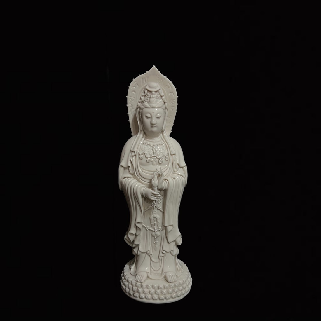 A Solemn Blance-De-Chine Statue of Avalokitesvara: A Solemn Blance-De-Chine Statue of Avalokitesvara,Ming Dynasty,China,He Chaozong Mark,Size:16.3in 德化瓷观音像,中国明代,何朝
