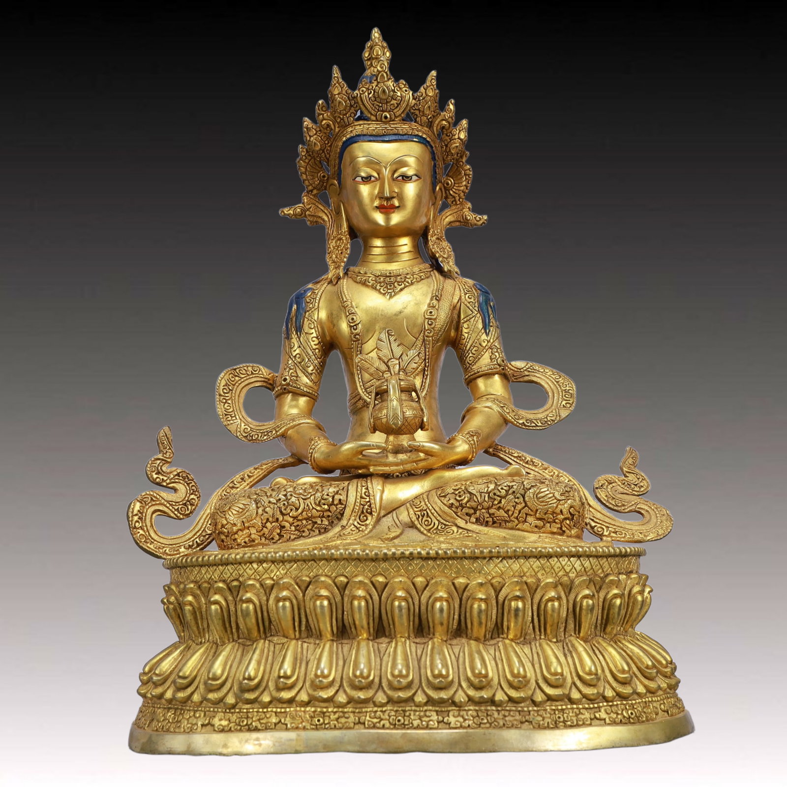 A Solemn Gilt Bronze Statue of Amitayus: A Solemn Gilt Bronze Statue of Amitayus,Ming Dynasty, China,Size:13inx10.4inx18.9in,Weight:12200g 铜鎏金无量寿佛像,中国明代