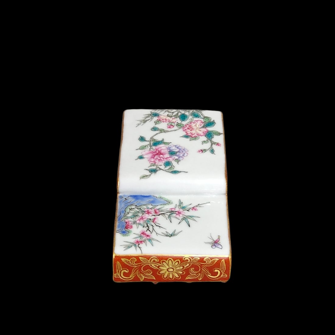 An Exquisite Coral Red Glazed Famille-Rose Painted Gold Flower and Butterfly Pattern Paper Weight: An Exquisite Coral Red Glazed Famille-Rose Painted Gold Flower and Butterfly Pattern Paper Weight,Qing Dynasty,China,Qianlong Four-character Mark,Size:0.9inx3.5in 