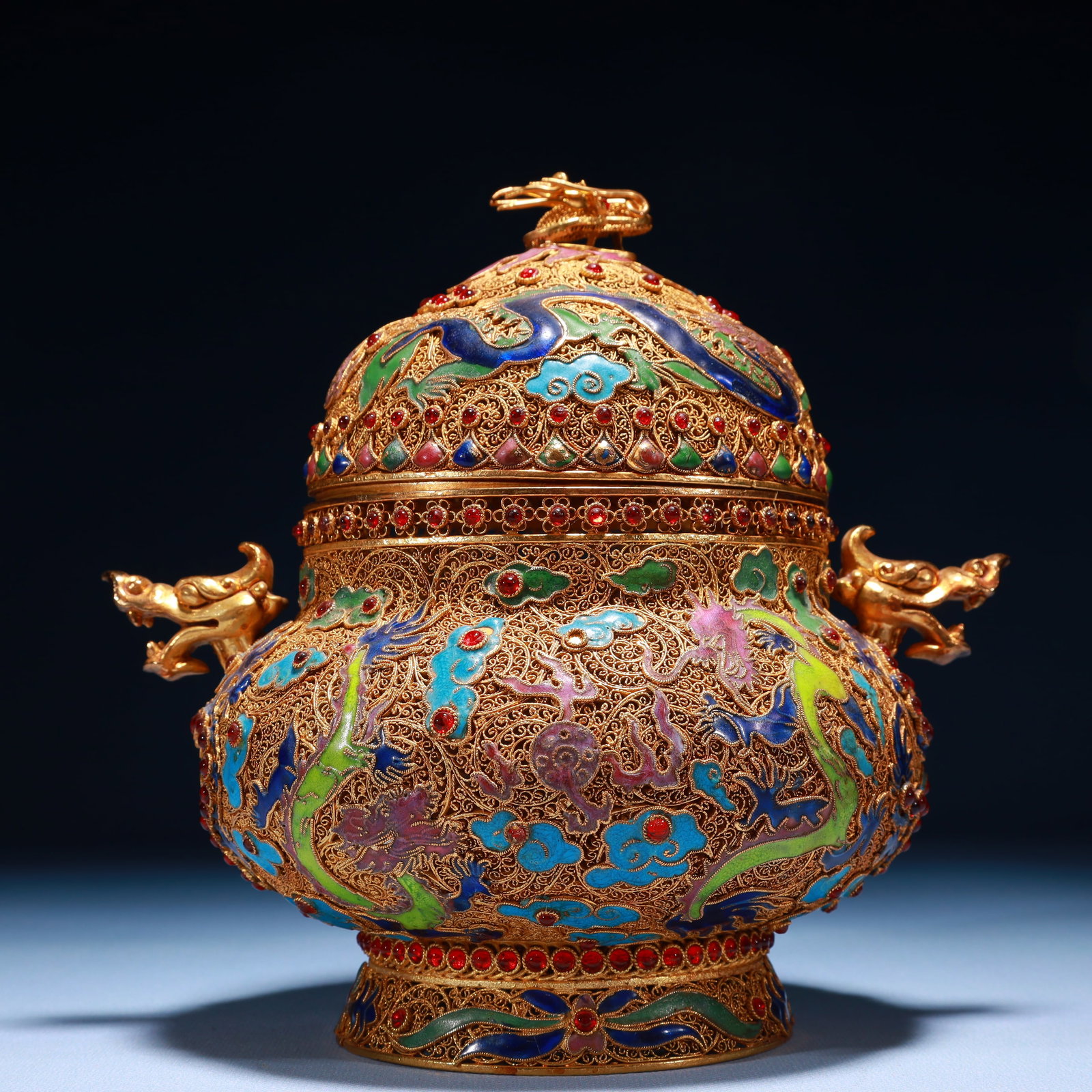 An Exquisite Filigree and Gilding Auspicious Cloud and Dragon Pattern Double-Ears Jar with: An Exquisite Filigree and Gilding Auspicious Cloud and Dragon Pattern Double-Ears Jar with Cover,Inlaid Gems,Qing Dynasty,China,Qianlong Four-character Mark,Size:7.9inx6.3inx8.3in,Weight:950g 