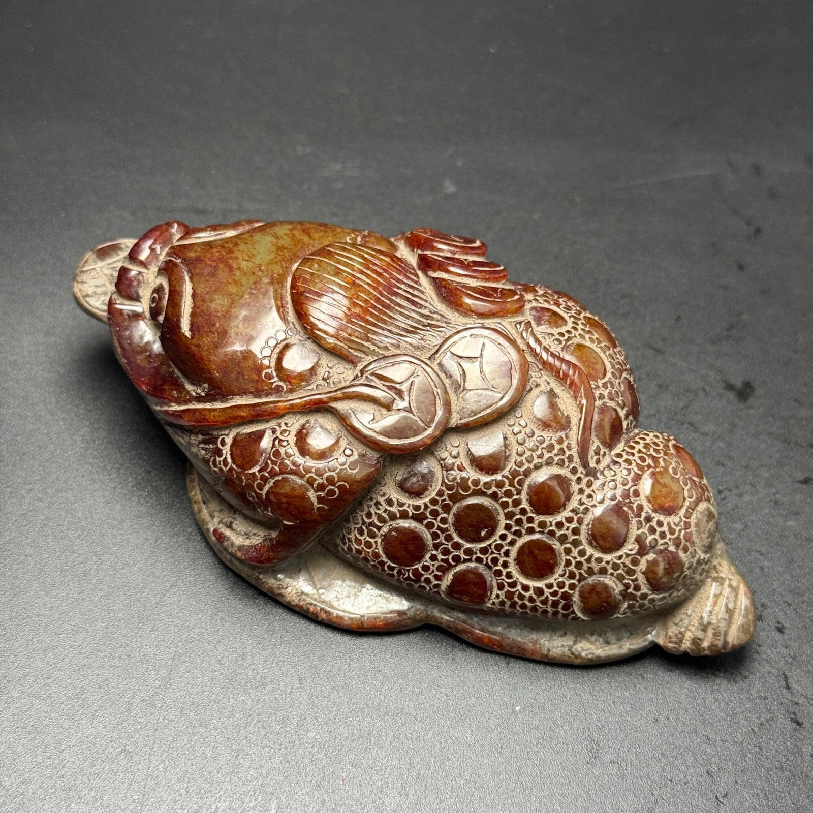 An Exquisite Archaic Jade Golden Toad Ornament (1 of 7)
