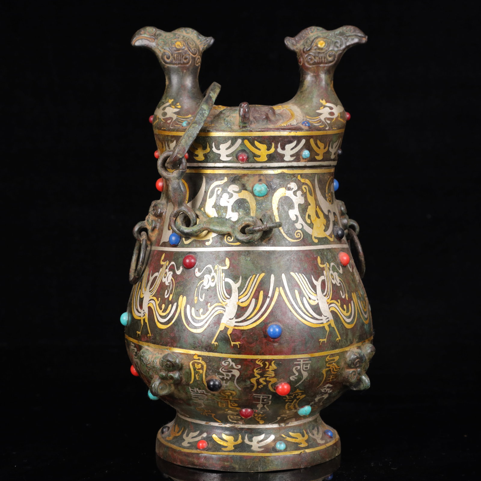 An Archaic Bronze Inlaid Gold and Silver Phoenix Pattern Double-Ears Ewer,Inlaid Gems: An Archaic Bronze Inlaid Gold and Silver Phoenix Pattern Double-Ears Ewer,Inlaid Gems,The Warring States period in China,With Mark,Size:5.5inx10.6in,Weight:1750g 铜错金银࠰