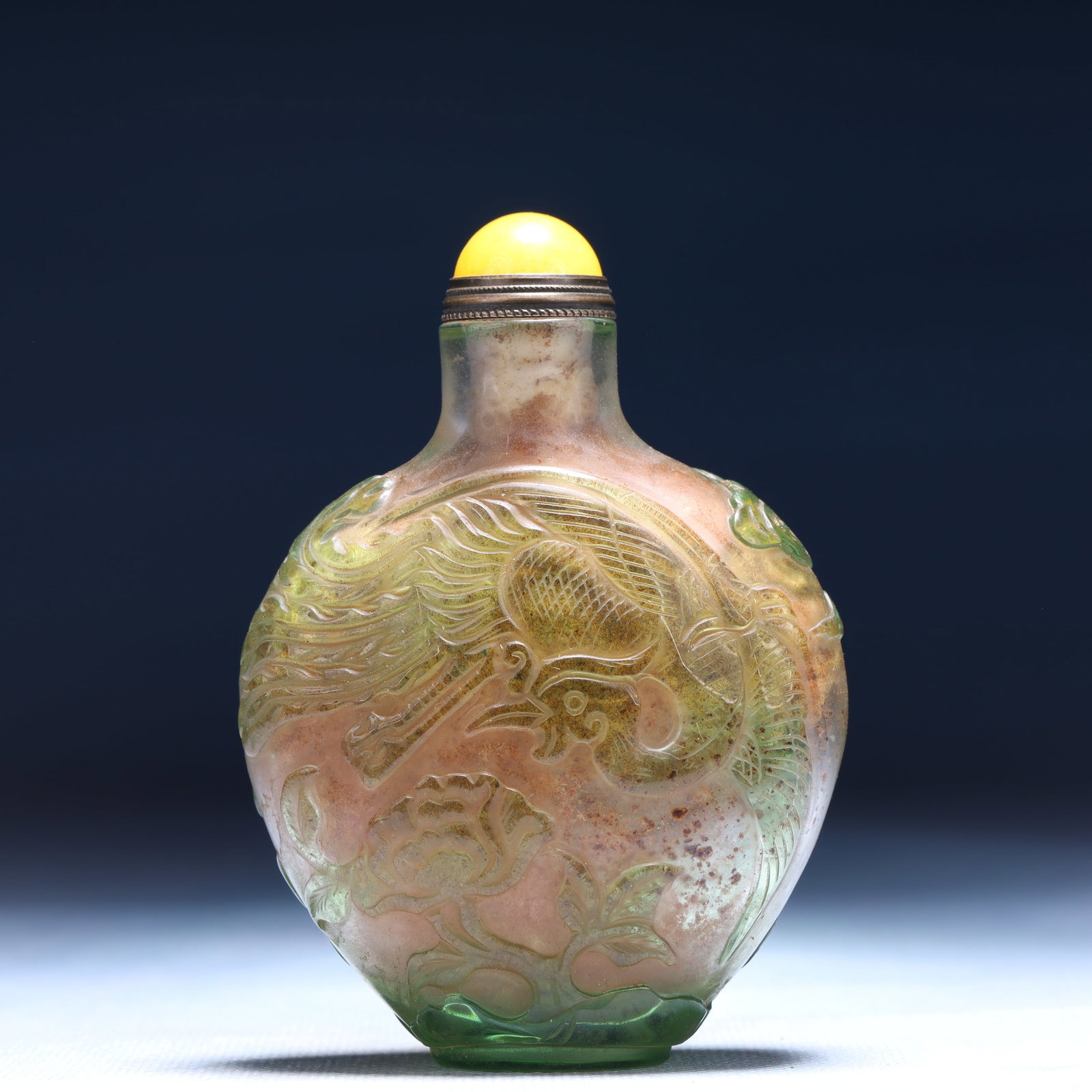 An Exquisite Glass Flower and Phoenix Pattern Snuff Bottle: An Exquisite Glass Flower and Phoenix Pattern Snuff Bottle,Qing Dynasty,China,Qianlong Four-character Mark,Size:2.6inx1.2inx3.5in,Weight:99g 琉璃花卉凤纹鼻