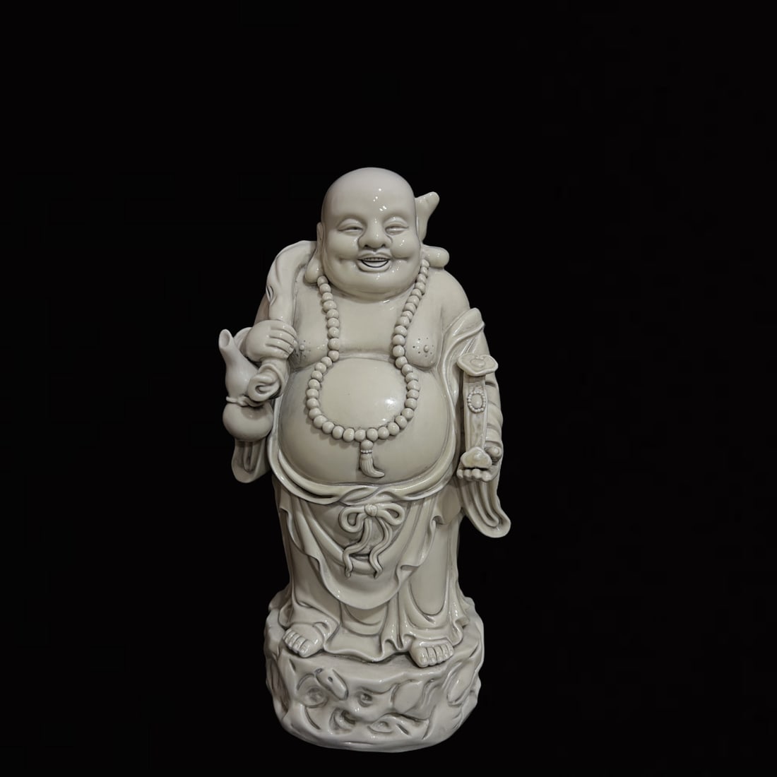 A Solemn Blance-De-Chine Statue of Maitreya Buddha (1 of 8)