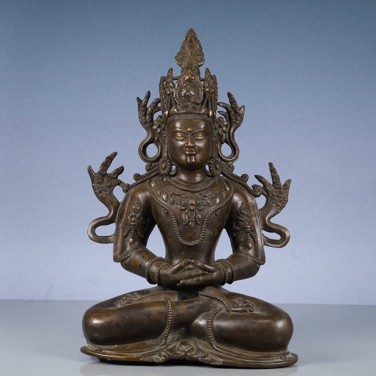 A Solemn Bronze Buddha Statue: A Solemn Bronze Buddha Statue,Qing Dynasty, China,Size:8.3inx4.7inx13.4in,Weight:3450g 铜佛像,中国清代