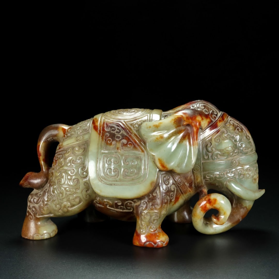 An Archaic Gaogu yu Elephant Ornament: An Archaic Gaogu yu Elephant Ornament,Ancient Time, China, Size:8.3inx4.3inx5.1in, Weight:2510g,高古玉大象摆件,中国远古时期