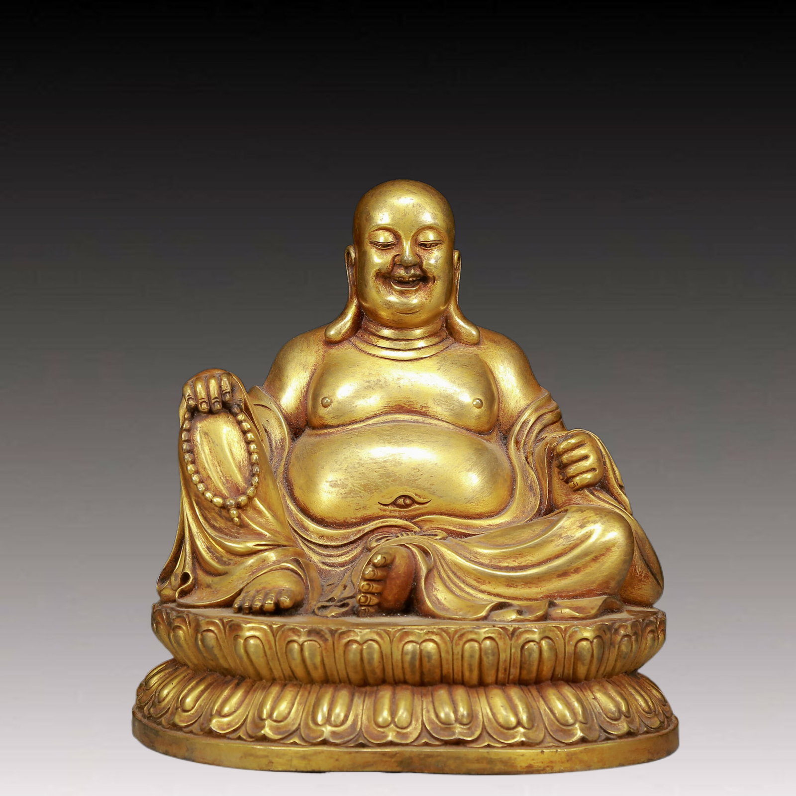 A Solemn Gilt Bronze Statue of Maitreya Buddha: A Solemn Gilt Bronze Statue of Maitreya Buddha,Ming Dynasty, China,Size:9.6inx9.4inx10.2in,Weight:6935g 铜鎏金弥勒佛像，明代