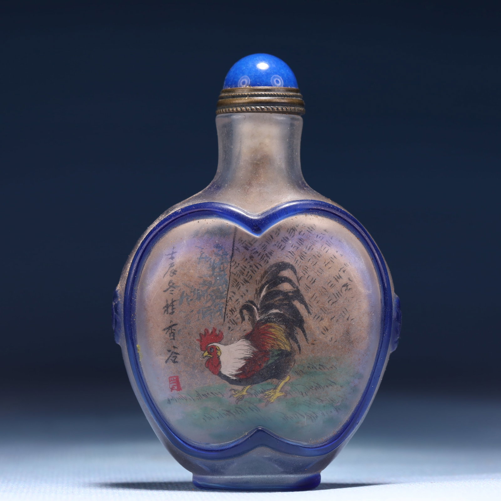 An Exquisite Glass Rooster Pattern Snuff Bottle: An Exquisite Glass Rooster Pattern Snuff Bottle,Qing Dynasty,China,Size:2inx1.2inx3.1in,Weight:68g 琉璃公鸡纹鼻烟壶,中国清代