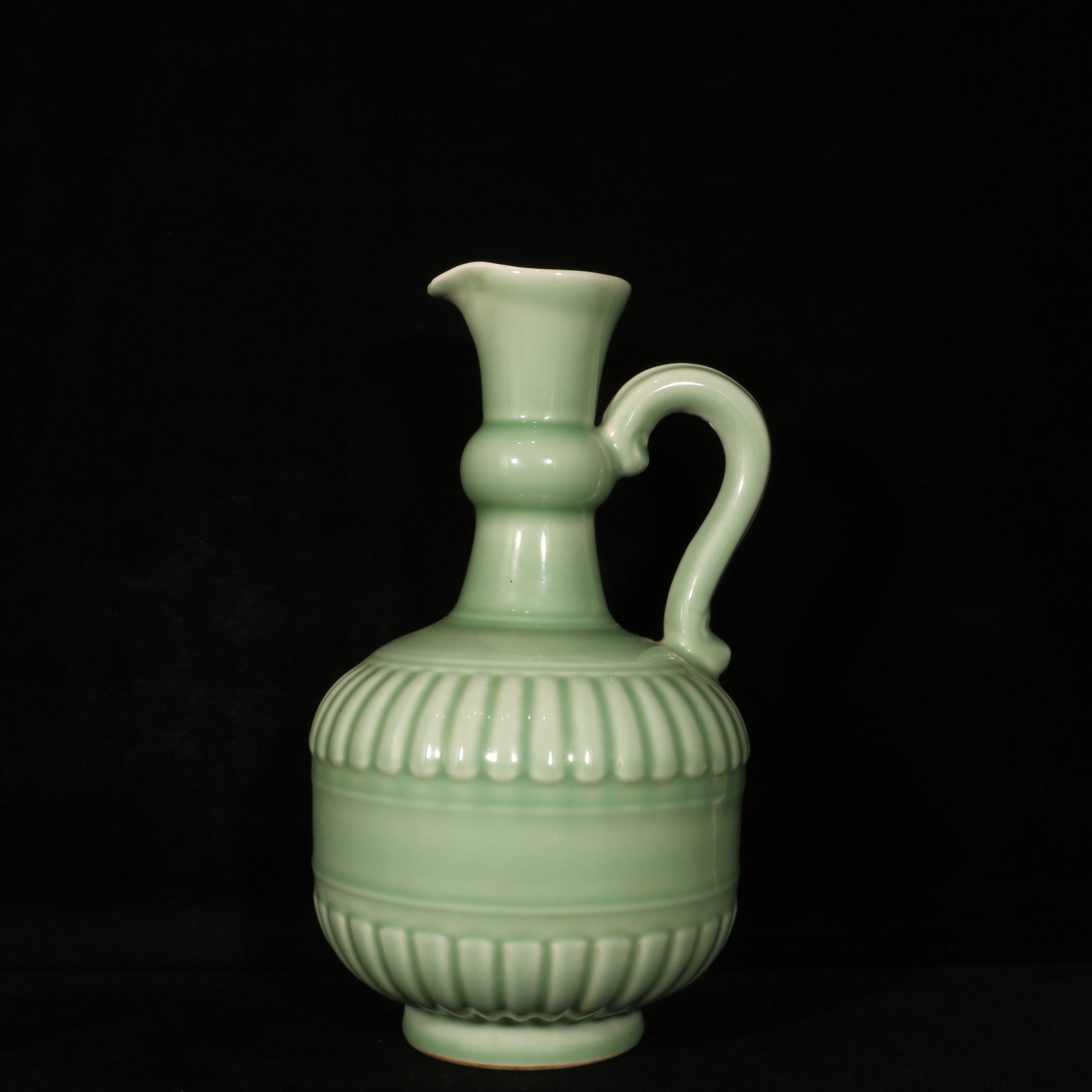 A Rare Celadon Glazed Ewer: A Rare Celadon Glazed Ewer,Qing Dynasty,China,Qianlong Six-character Mark,Size:12.6inx6.7in 青釉执壶,中国清代,乾隆六字款