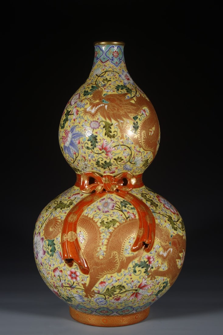 A Huge Yellow Ground Enamel Lotus and Dragon Pattern Gourd-Shaped Vase: A Huge Yellow Ground Enamel Lotus and Dragon Pattern Gourd-Shaped Vase,Qing Dynasty,China,Qianlong Four-character Mark,Size:19.3inx5.5in 黄地珐琅彩缠枝莲