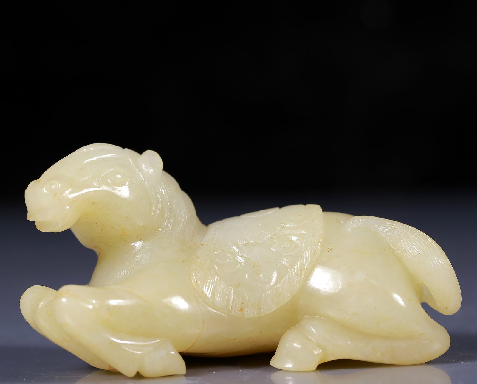 An Exquisite Yellow Jade Horse Ornament: An Exquisite Yellow Jade Horse Ornament ,Qing Dynasty, China,Size:3.5inx1.2inx2in,Weight:195g 黄玉马摆件，清代