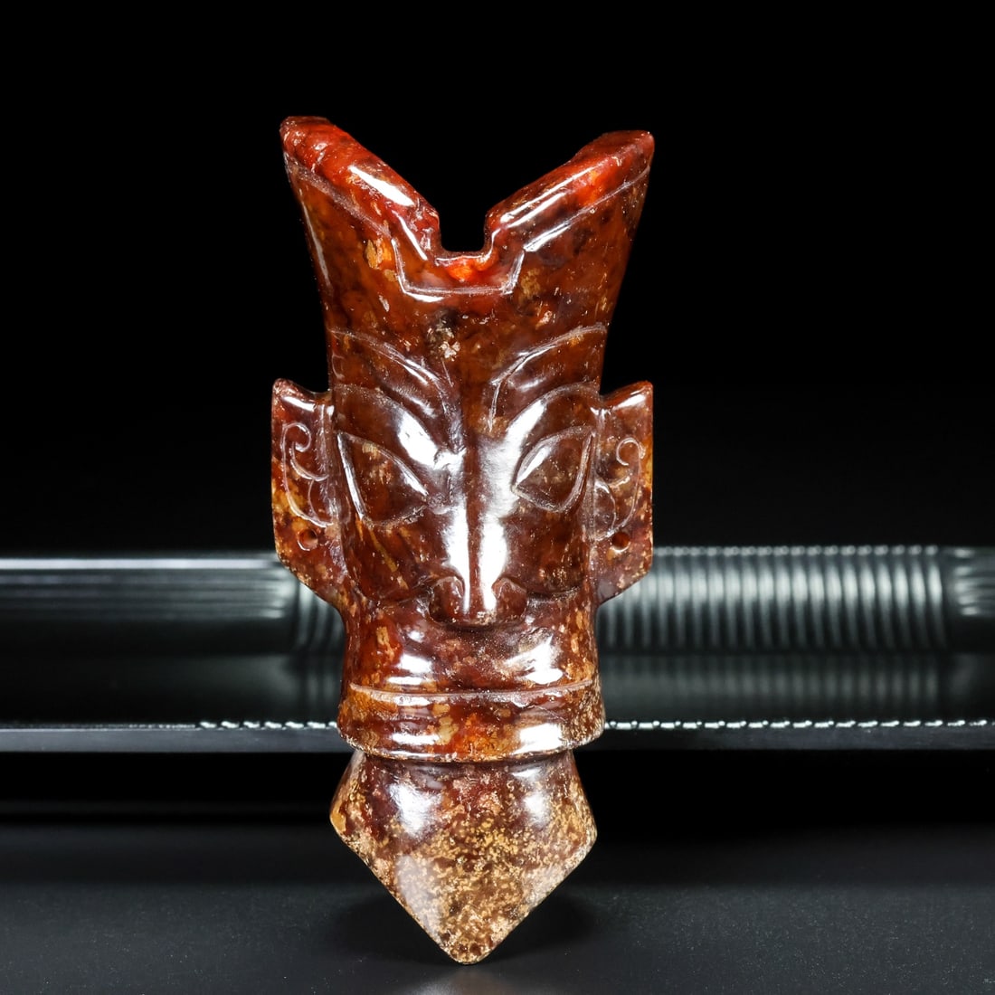 An Exquisite Archaic Jade Figure-Face Pattern Ornament: An Exquisite Archaic Jade Figure-Face Pattern Ornament,Ancient Time,China,Size:2inx1.8inx4.3in,Weight:217g 高古玉人面纹摆件,中国远