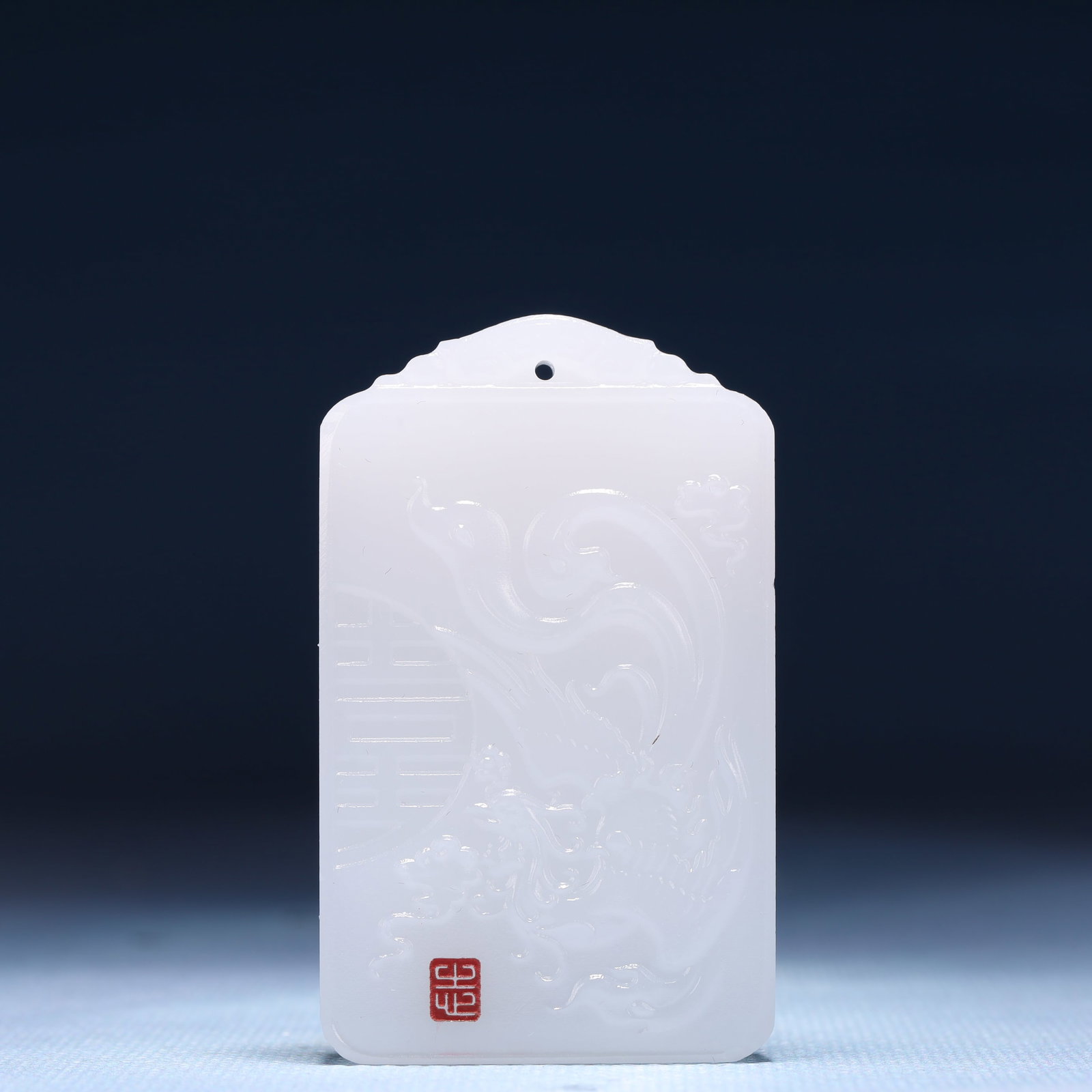An Exquisite White Jade Auspicious Cloud and Phoenix Pattern Pendant: An Exquisite White Jade Auspicious Cloud and Phoenix Pattern Pendant,Size:1.6inx0.4inx2.4in,Weight:53g 白玉祥云凤纹牌