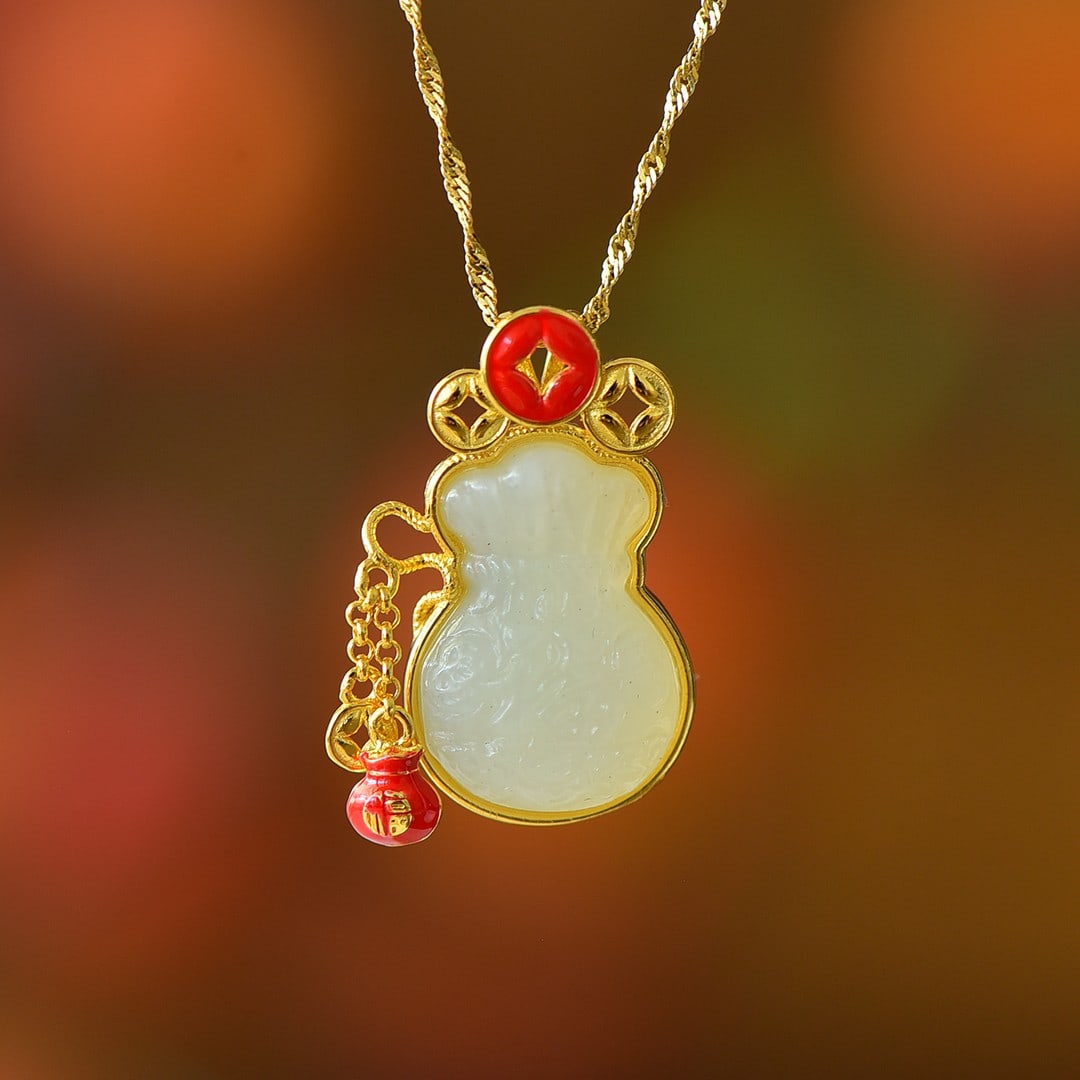 An Exquisite Sterling Silver-Gold Plated Inlaid White Jade Pendant: An Exquisite Sterling Silver-Gold Plated Inlaid White Jade Pendant,Size:0.6inx0.8in 纯银镀金镶白玉吊坠