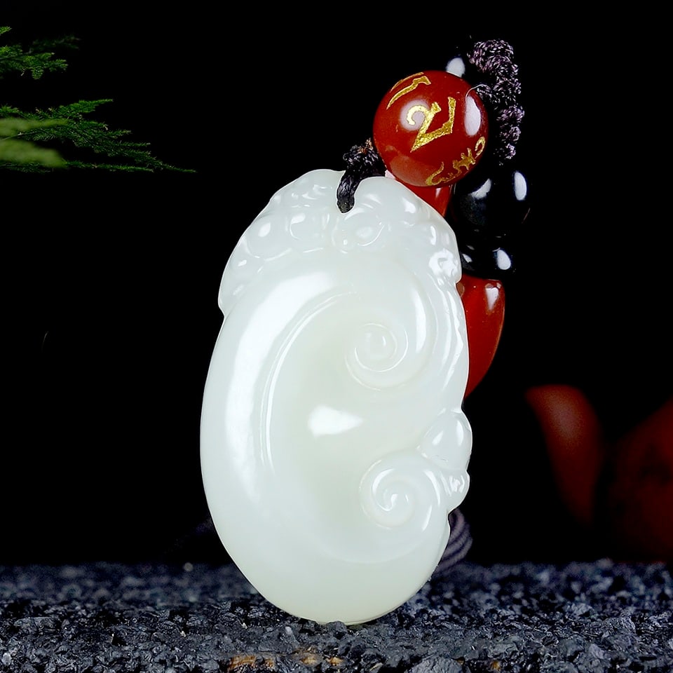 An Exquisite White Jade Ruyi Pendant (1 of 6)