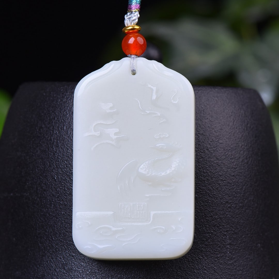 An Exquisite White Jade Dragon and Phoenix Pattern Pendant (1 of 5)