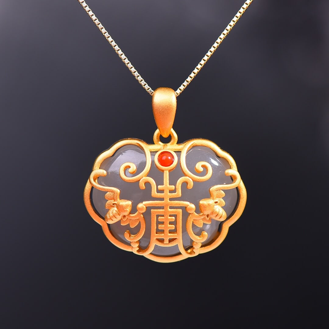 An Exquisite Sterling Silver-Gold Plated Inlaid White Jade Pendant: An Exquisite Sterling Silver-Gold Plated Inlaid White Jade Pendant,Size:0.6inx0.8in 纯银镀金镶白玉吊坠