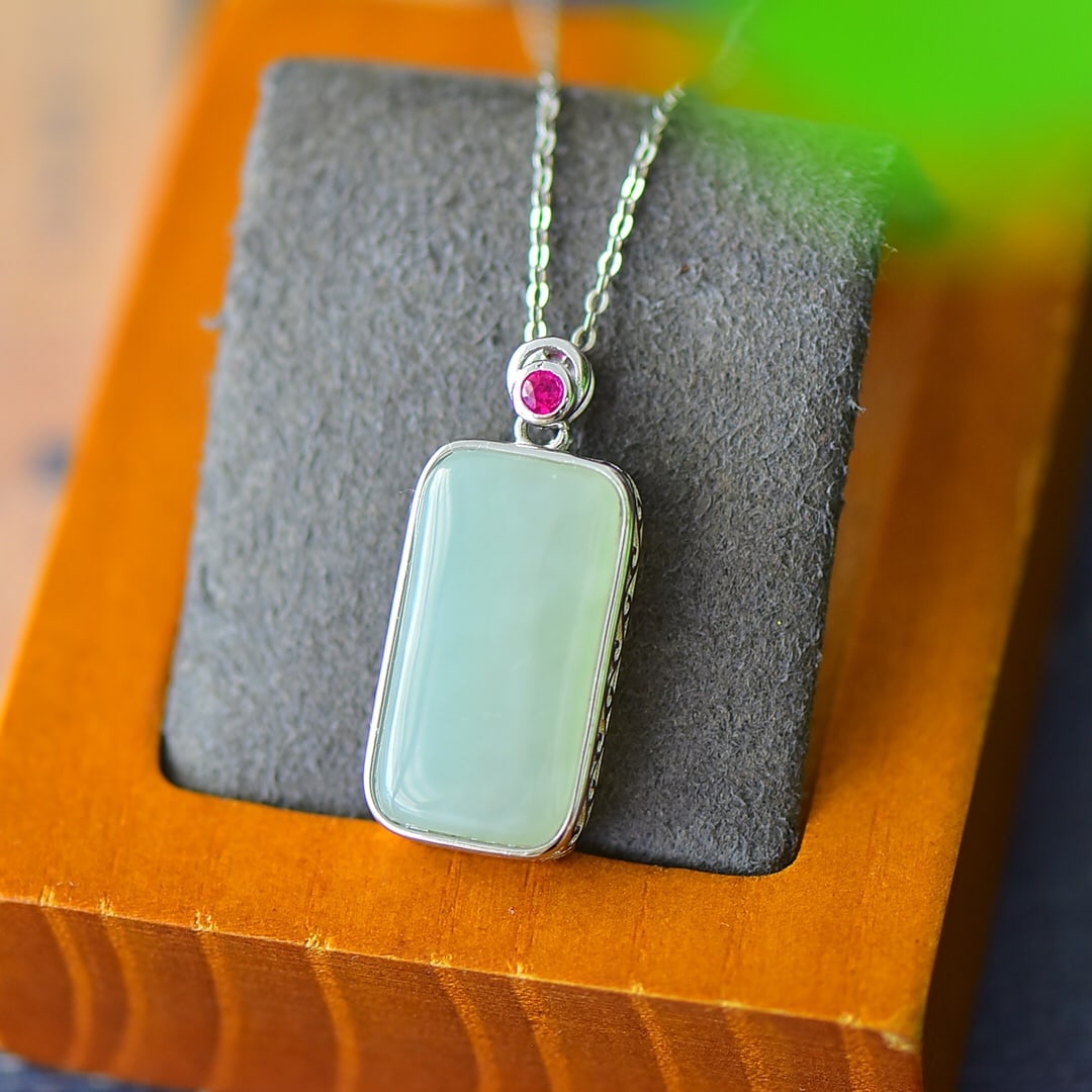 A Pair of Exquisite Sterling Silver Inlaid White Jade Necklace: A Pair of Exquisite Sterling Silver Inlaid White Jade Necklace,Size:0.5inx1.1in 纯银镶白玉项链