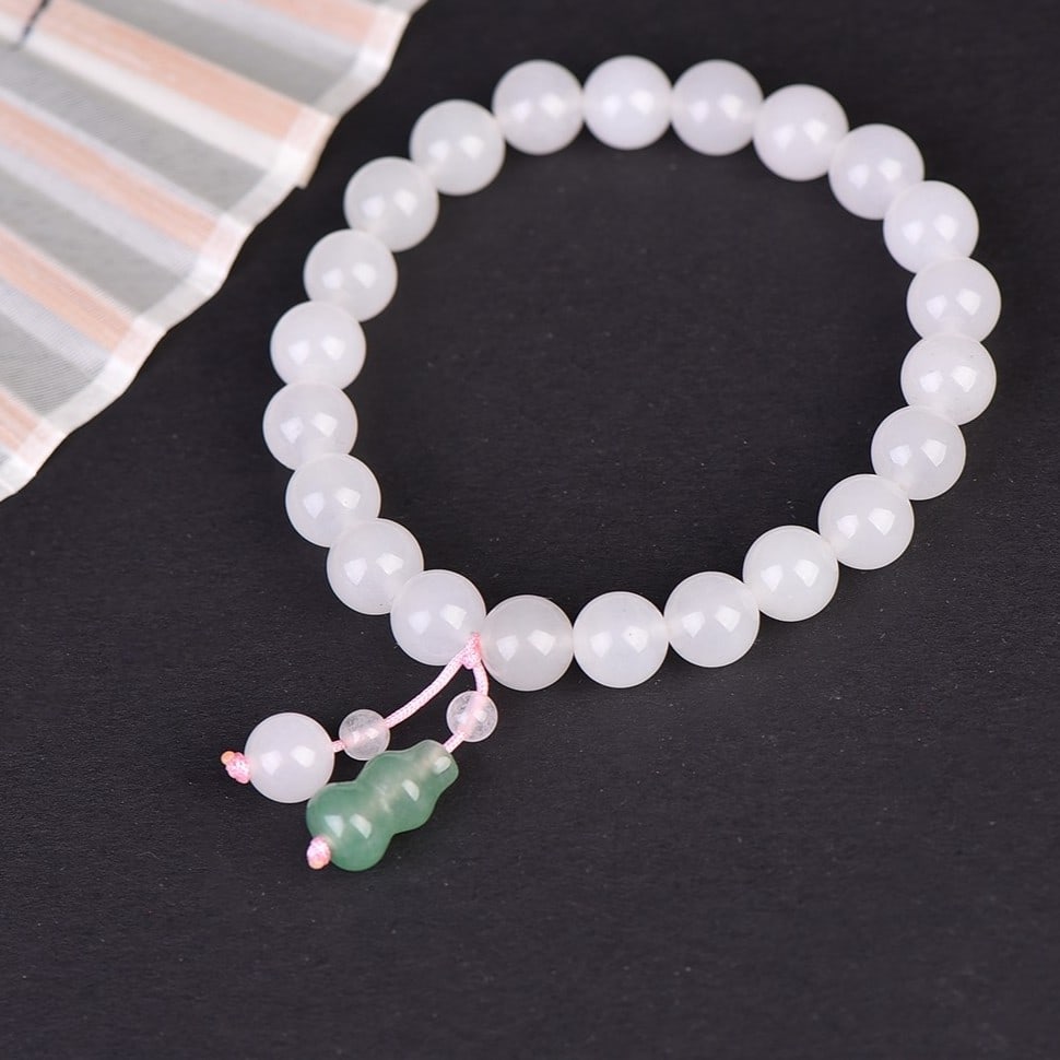 An Exquisite White Jade Bracelets: An Exquisite White Jade Bracelet,Size:0.3in 白玉手串
