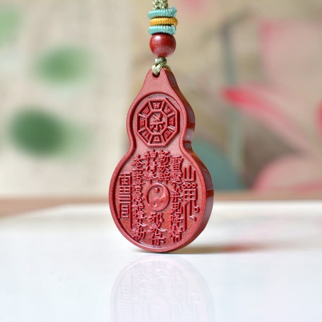 An Exquisite Cinnabar Gourd Pendant: An Exquisite Cinnabar Gourd Pendant,Size:1inx1.6in,Weight:9.63g 朱砂葫芦挂件