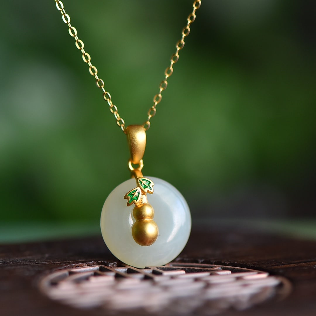 An Exquisite Sterling Silver-Gold Plated Inlaid White Jade Pendant: An Exquisite Sterling Silver-Gold Plated Inlaid White Jade Pendant 纯银镀金镶白玉吊坠