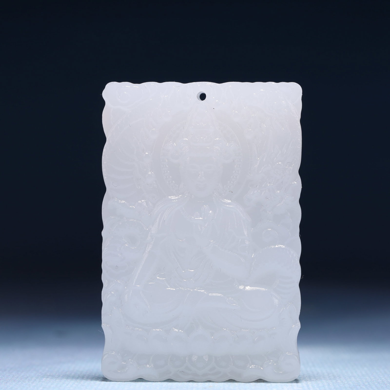 An Exquisite White Jade Statue of Avalokitesvara Pendant: An Exquisite White Jade Statue of Avalokitesvara Pendant,Size:1.6inx0.4inx2.4in,Weight:53g 白玉观音像牌