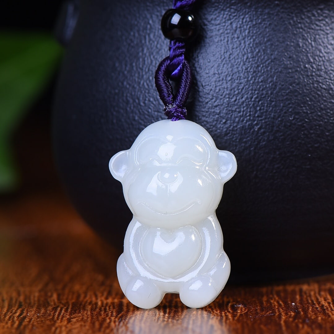 An Exquisite White Jade Monkey Pendant (1 of 5)