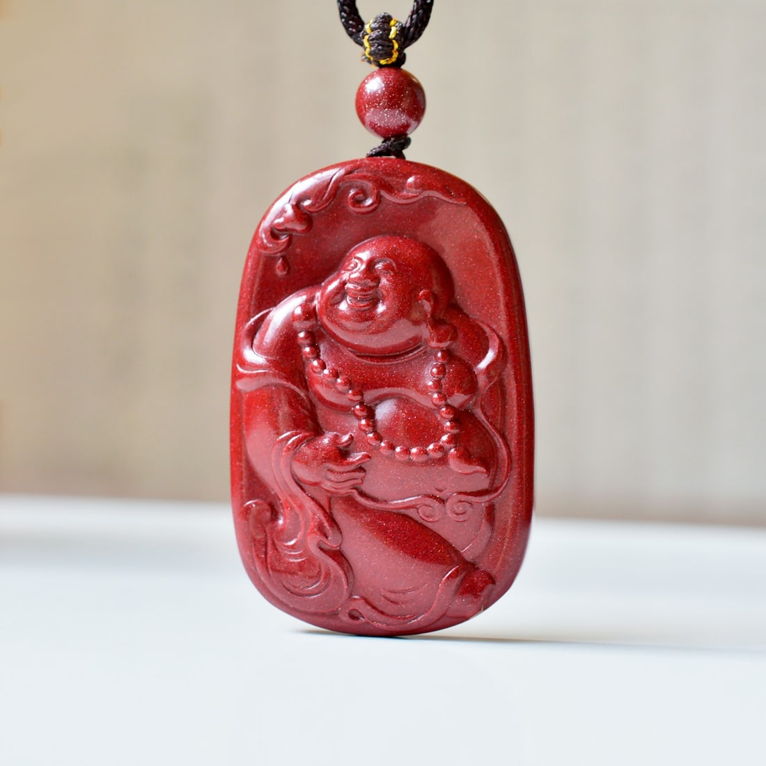 An Exquisite Cinnabar Pendant with Statue of Maitreya Buddha: An Exquisite Cinnabar Pendant with Statue of Maitreya Buddha,Size:1.4inx2.1in,Weight:40g 朱砂挂件带弥勒佛像
