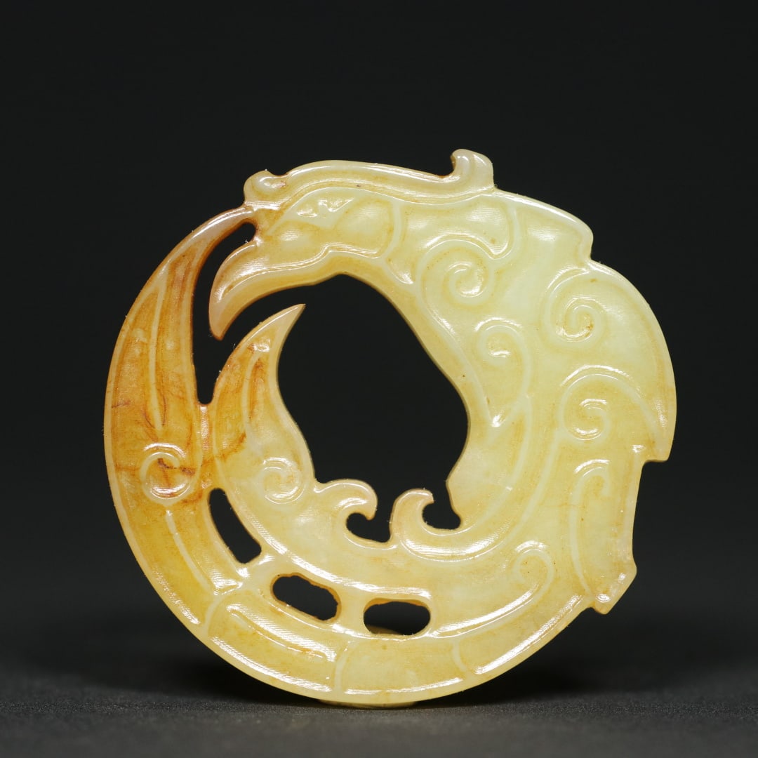 An Exquisite White Jade Phoenix Pattern Pendant: An Exquisite White Jade Phoenix Pattern Pendant Shi jia he Culture Size:2inx0.3in Weight:26.9g白玉团凤玉凤挂件 石家河文化