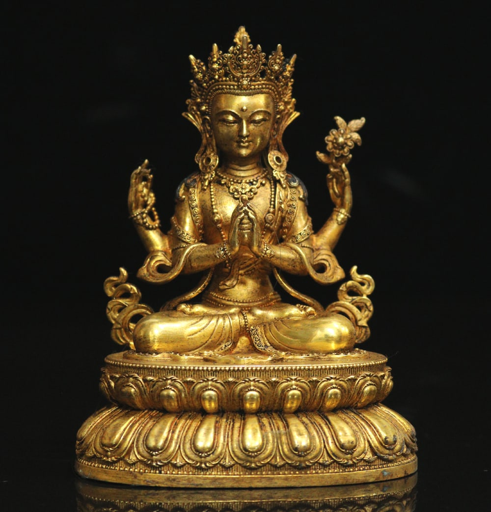 An Exquisite Gilt Bronze Four-arms Statue of Avalokitesvara Ornament: An Exquisite Gilt Bronze Four-arms Statue of Avalokitesvara Ornament Ming Dynasty, China Size:3.9inx3.1in Weight:530g铜鎏金四臂观音摆件