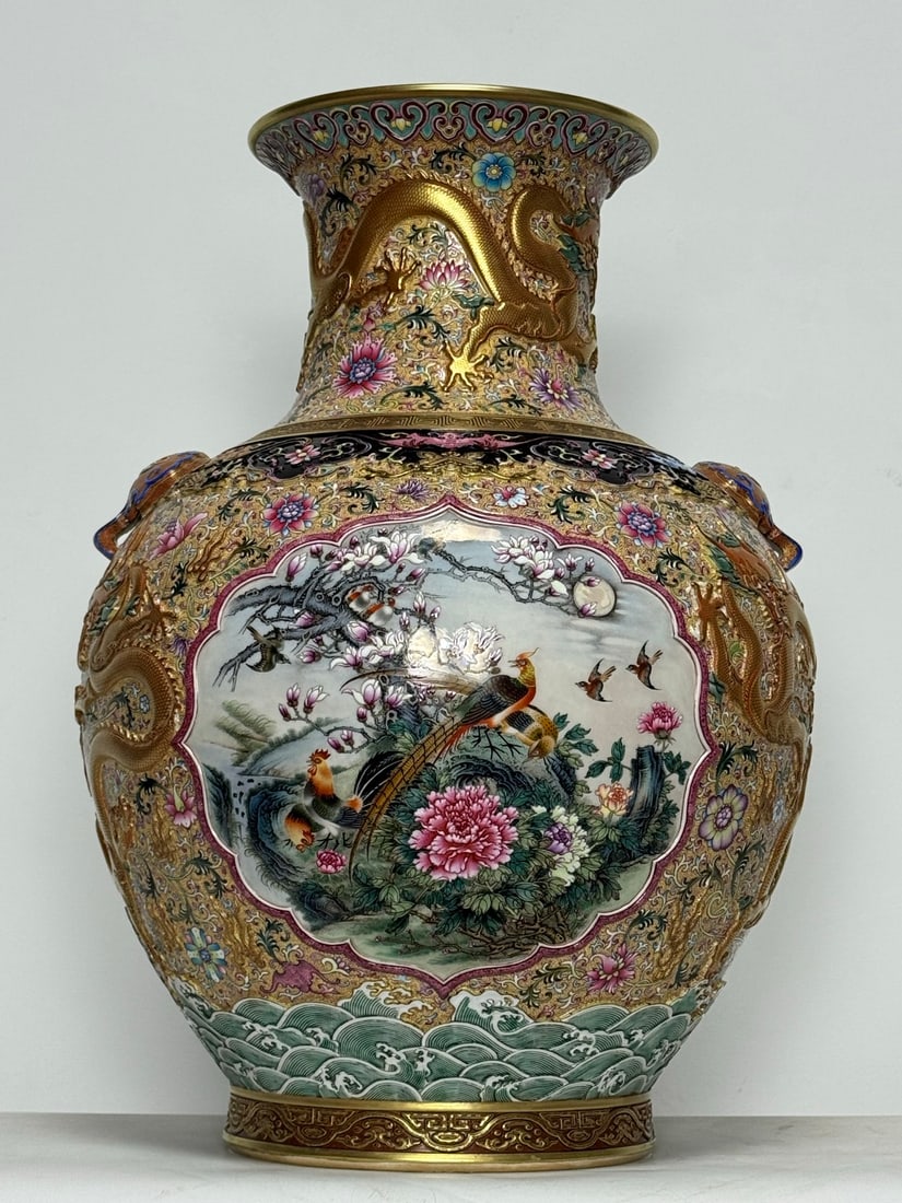 An Exquisite Enamel Lotus Pattern Flower and Bird Pattern Dragon Pattern Seawater Pattern: An Exquisite Enamel Lotus Pattern Flower and Bird Pattern Dragon Pattern Seawater Pattern Double-Ears Vase Qing Dynasty, China Qianlong Six-character Mark Size:21.3inx16.5in珐琅彩