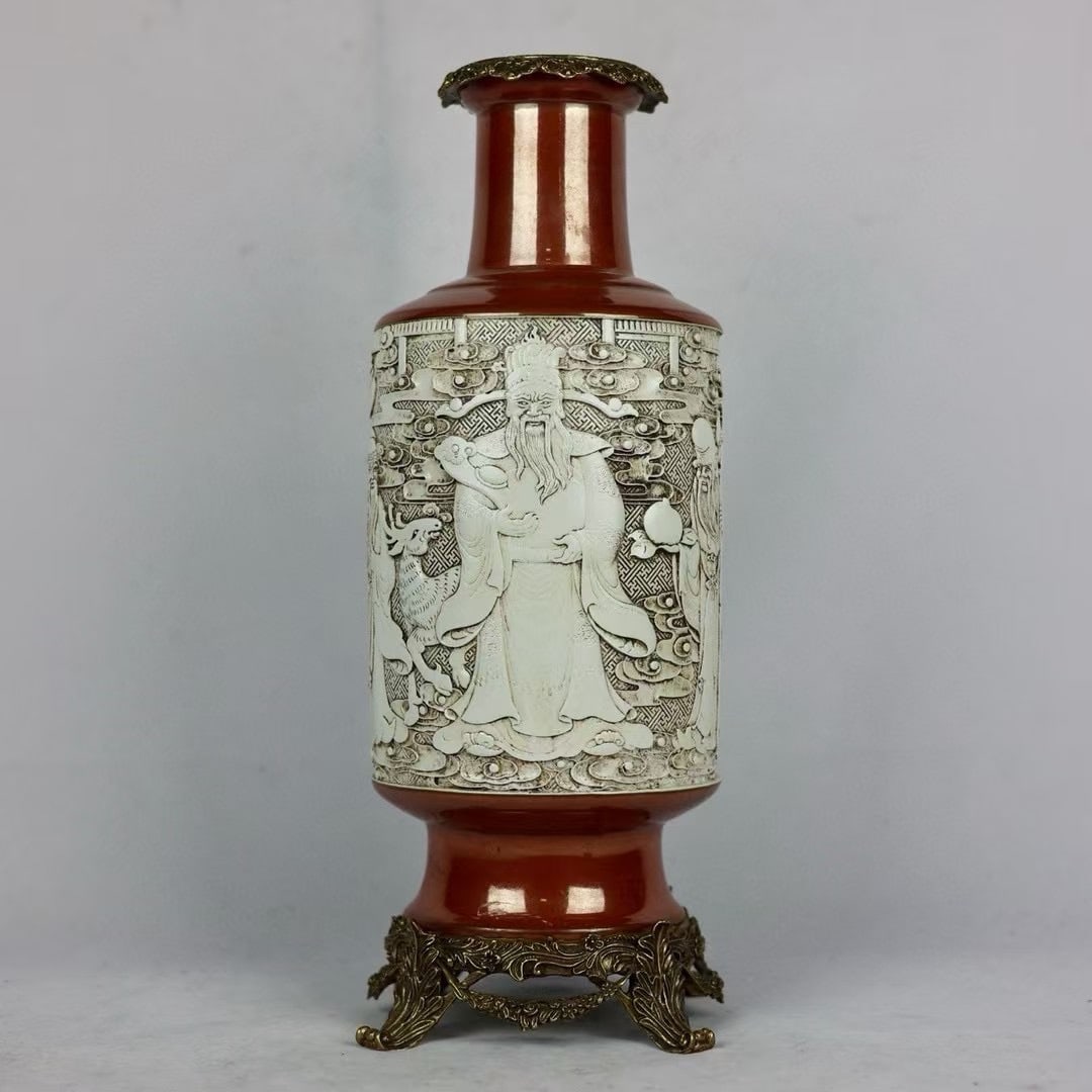 An Exquisite Red Glazed Inlaid Bronze Character and Story Pattern Vase: An Exquisite Red Glazed Inlaid Bronze Character and Story Pattern Vase Modern Time of China Size:18.9inx6.7in红釉镶铜棒槌瓶 近现代