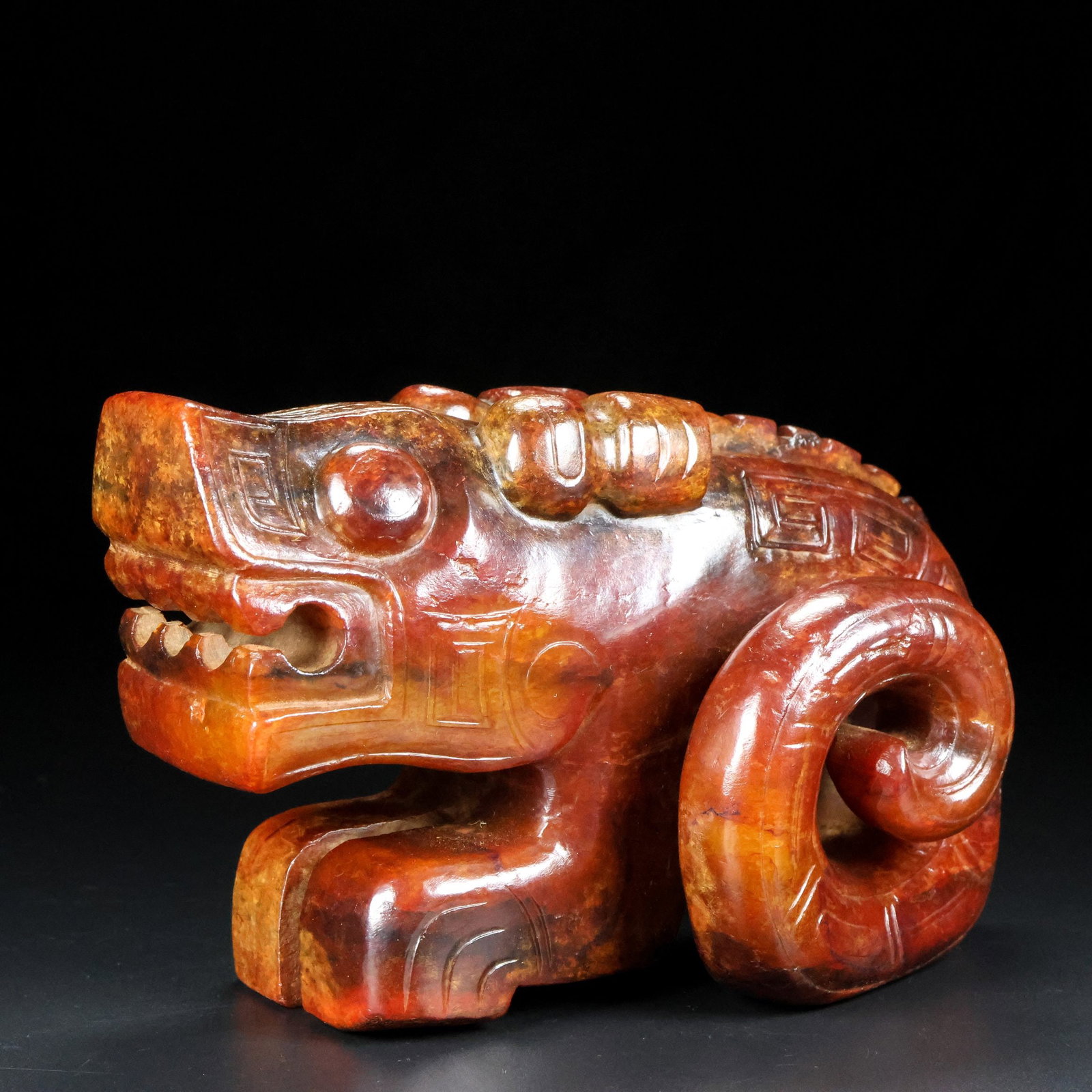 An Exquisite White Jade Dragon Ornament: An Exquisite White Jade Dragon Ornament S.Zhou , China Size:6.5inx4.1inx3.5in Weight:1.736kg白玉卷尾龙 商周时期 Size:16.5cmx10.5cmx8.8cm