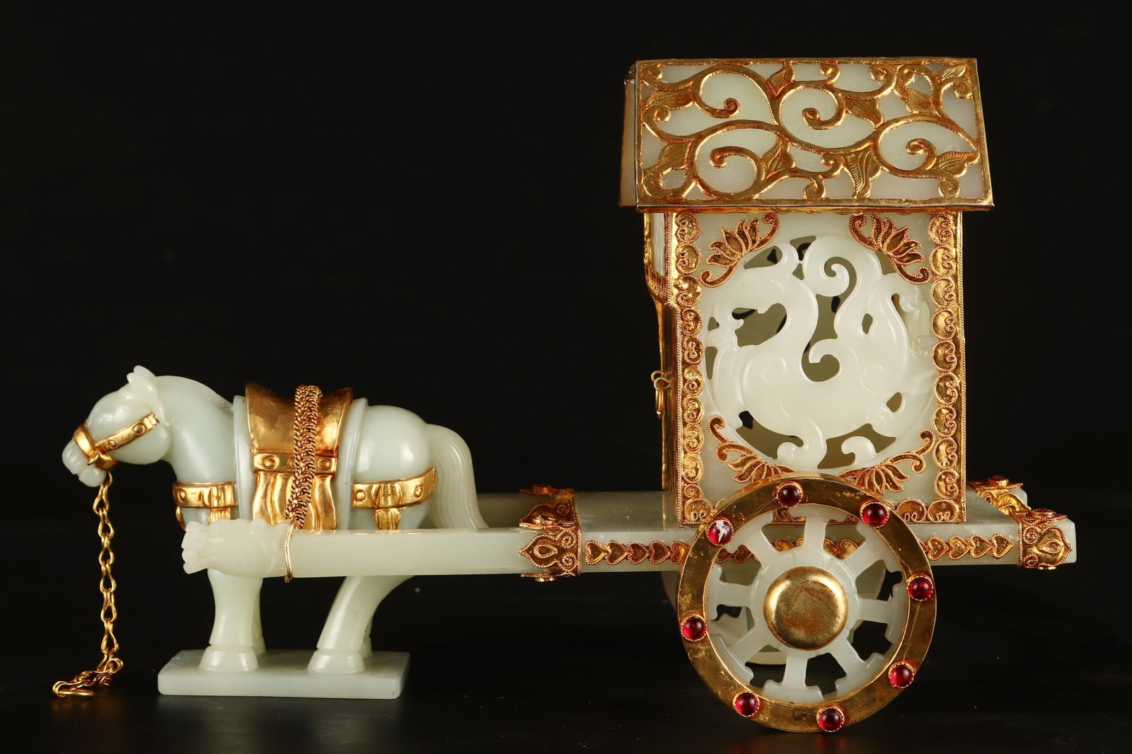 An Exquisite Gilt Bronze Inlaid White Jade Carriage: An Exquisite Gilt Bronze Inlaid White Jade Carriage Qing Dynasty, China Size:9.3inx3.7inx6.3in Weight:963g铜鎏金镶玉马拉车一套
