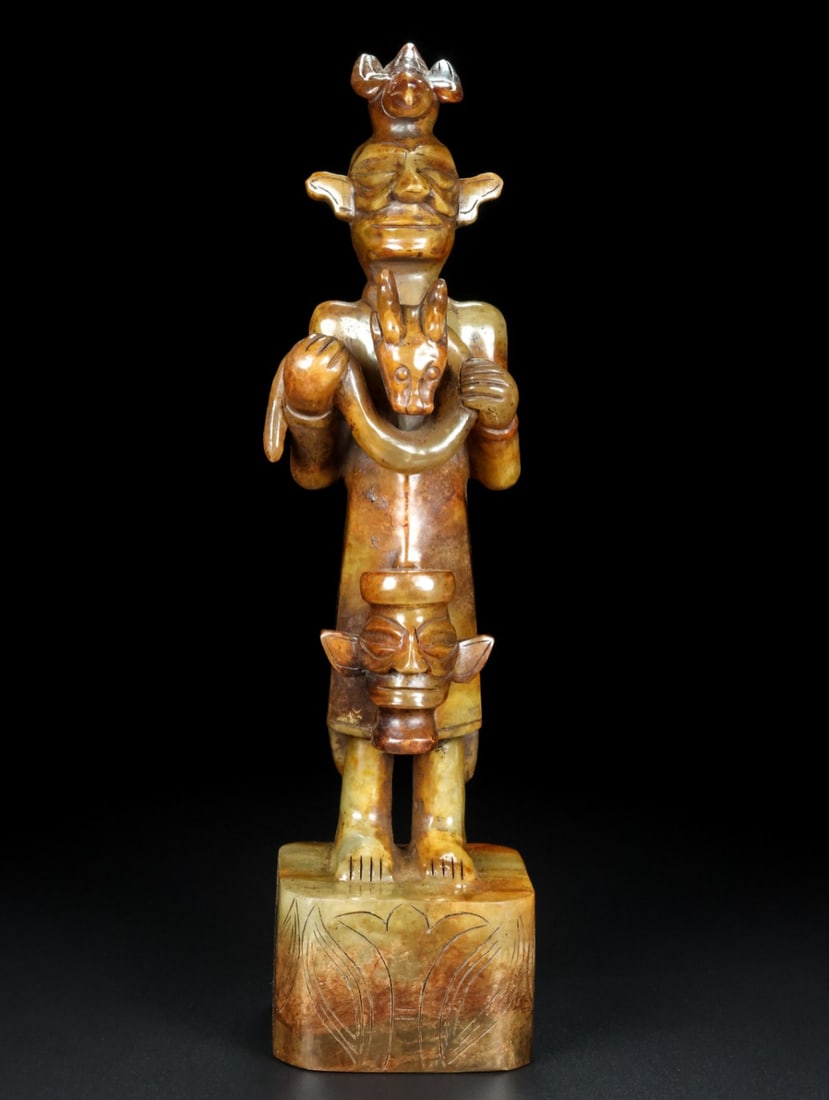 An Exquisite White Jade Figure Ornament: An Exquisite White Jade Figure Ornament Han Dynasty, China Size:10.9inx2.8inx2.6in Weight:1.226kg白玉人龙凤摆件 中国汉代