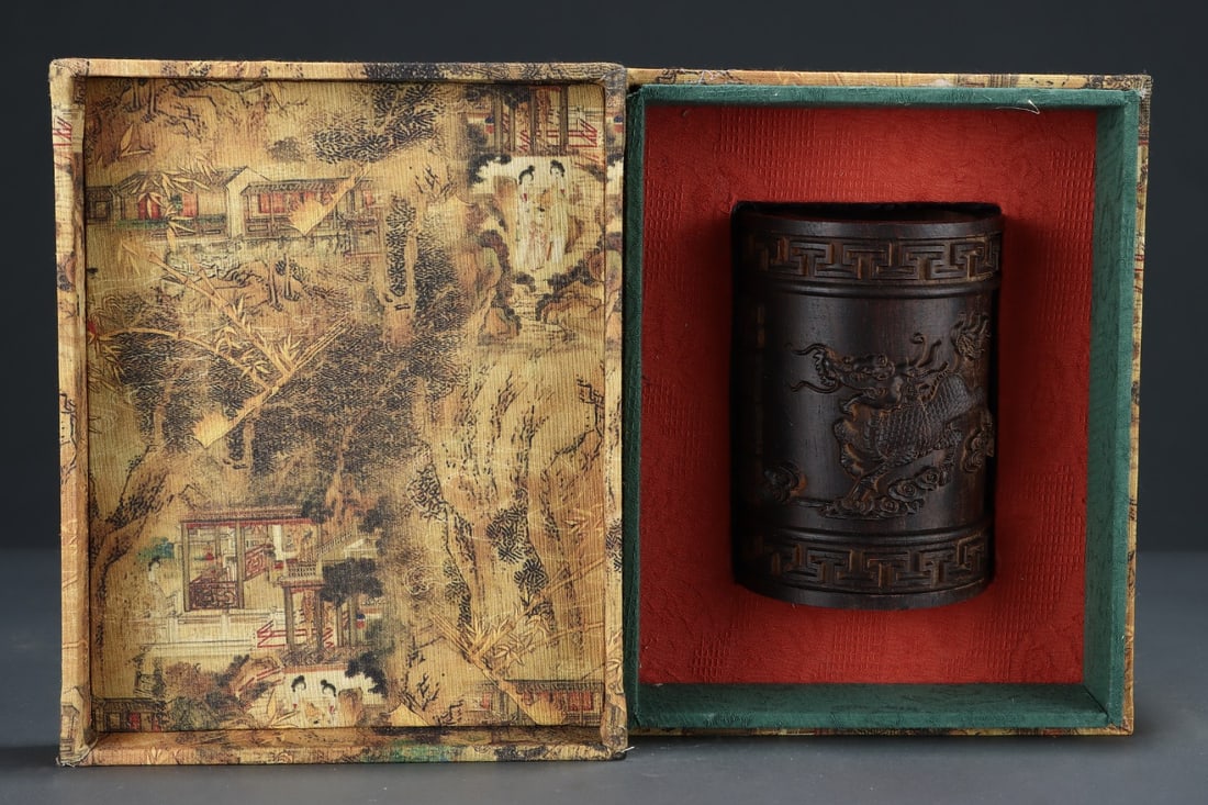 An Exquisite Eaglewood Auspicious Beast Pattern Brush Pot: An Exquisite Eaglewood Auspicious Beast Pattern Brush Pot Qing Dynasty, China Size:5.8inx4.1in沉香木笔筒招财麒麟 中国清代 
