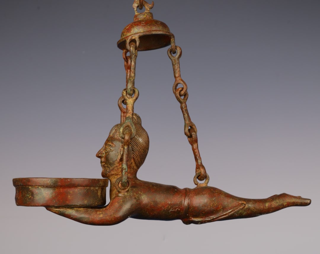 An Exquisite Bronze With Inscription Figure-Shaped Candlestick: An Exquisite Bronze With Inscription Figure-Shaped Candlestick Han Dynasty, China Size:6.7inx10.2in Weight:900g青铜链子人灯 中国汉代
