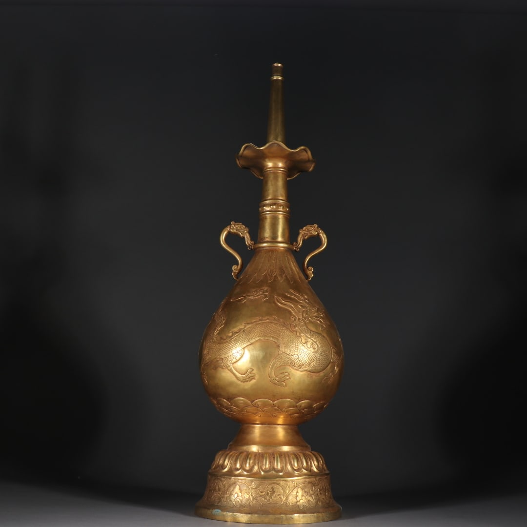 An Exquisite Gilt Bronze Dragon Pattern Double-Ears Vase: An Exquisite Gilt Bronze Dragon Pattern Double-Ears Vase Qing Dynasty, China Size:21.7inx5.7in Weight:2552.3g铜鎏金龙纹双耳长颈瓶