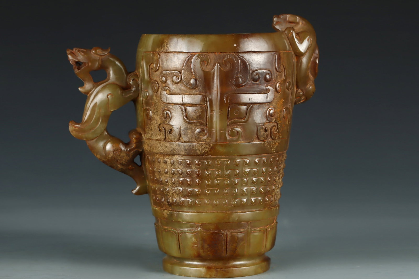 An Exquisite White Jade Beast-Face Pattern Cup (1 of 9)