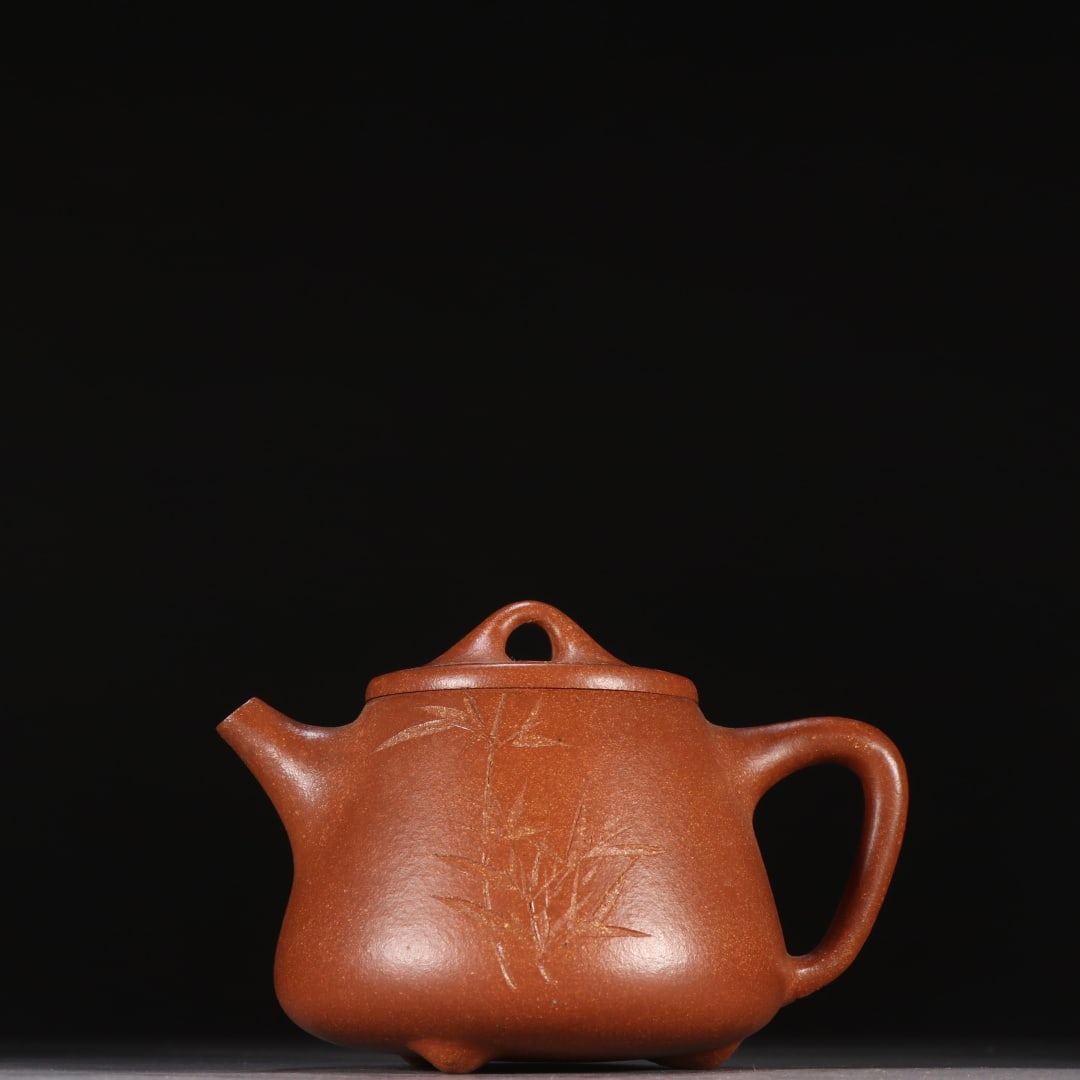 An Exquisite Purple Sands Bamboo Pattern with poem Teapot: An Exquisite Purple Sands Bamboo Pattern with poem Teapot Qing Dynasty, China Size:3.1inx4.9in紫砂刻诗文茶壶 中国清代 Size:8cmx12.5cm