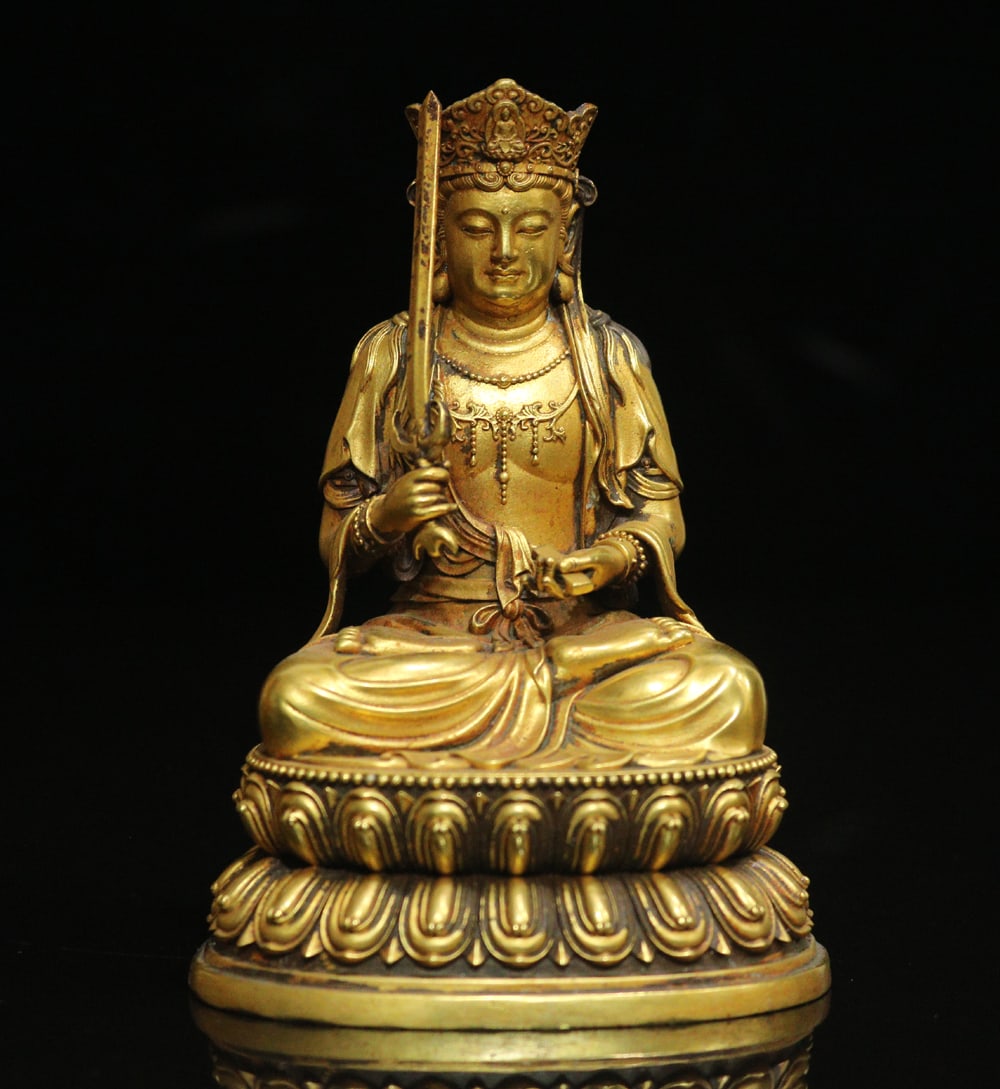 An Exquisite Gilt Bronze Statue of Manjusri Ornament: An Exquisite Gilt Bronze Statue of Manjusri Ornament Ming Dynasty, China Size:4.3inx3in Weight:545g铜鎏金文殊菩萨摆件