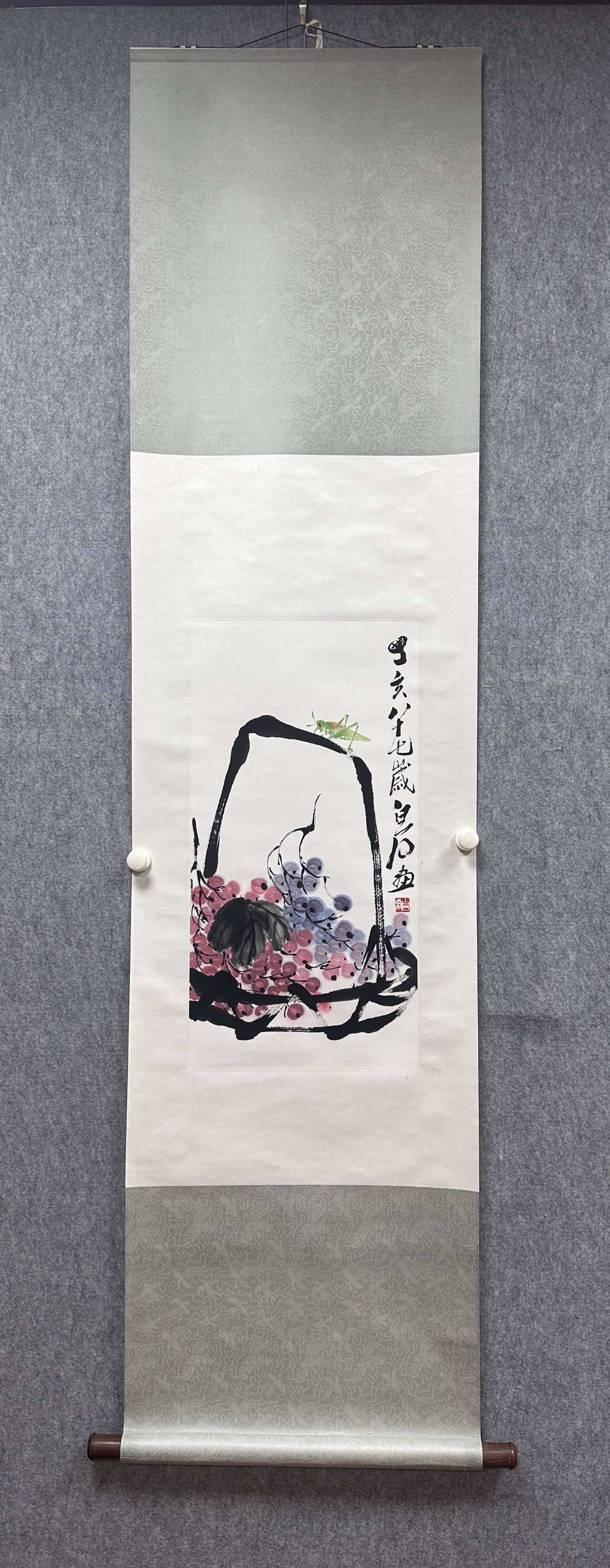 A Chinese Vertical Scroll Ink Painting of Grapes on Paper: A Chinese Vertical Scroll Ink Painting of Grapes on Paper Qi baishi Without frame Size:13.8inx26.8in齐白石葡萄 纸本立轴Without frame Size:35cmx68c