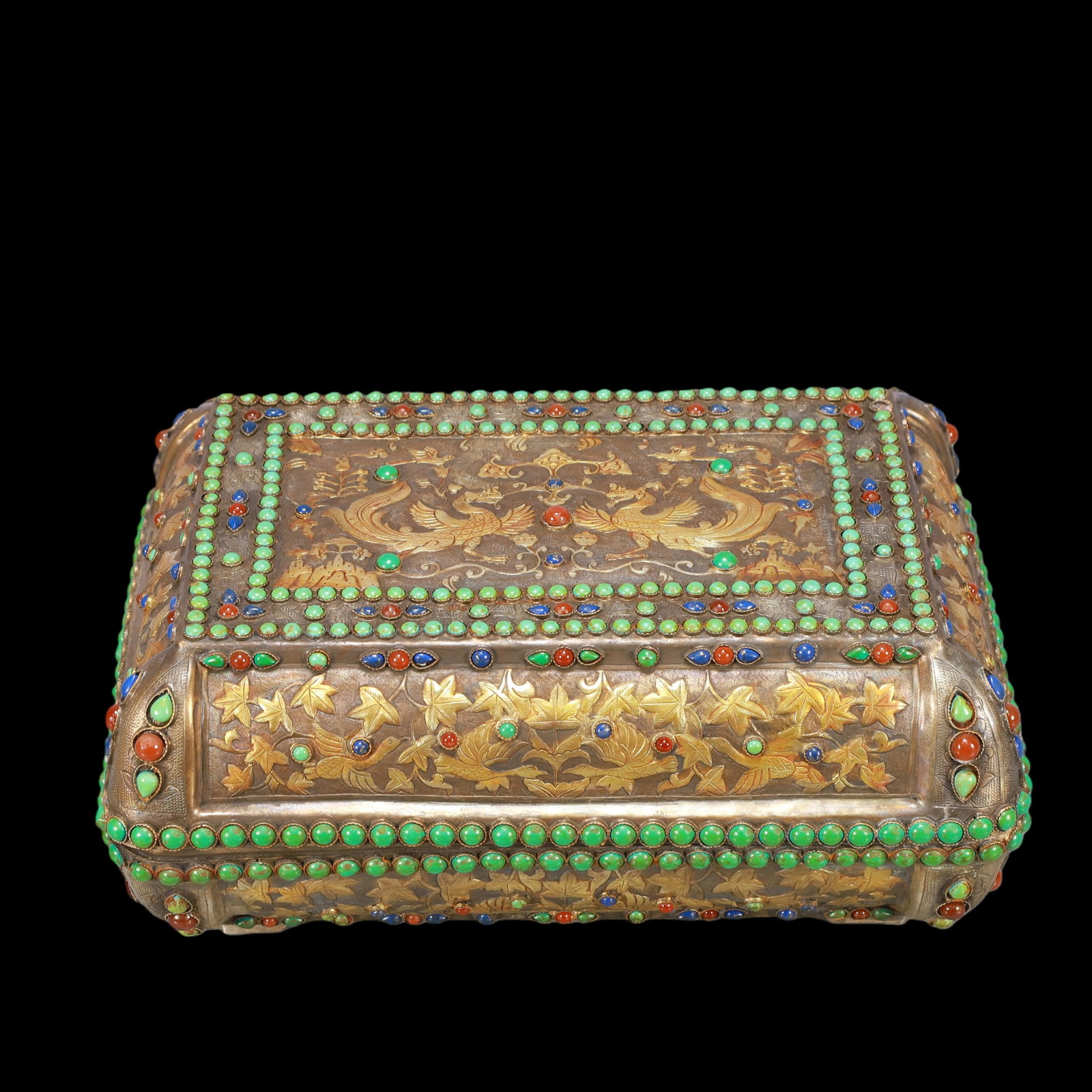 A Exquisite Gilt Silver Inlaid Gems Lotus Pattern Phoenix Pattern Box: A Exquisite Gilt Silver Inlaid Gems Lotus Pattern Phoenix Pattern Box Tang Dynasty, China Zhenguan Four-character Mark Size:12.2inx5.9in Weight:2200g银鎏金嵌百宝