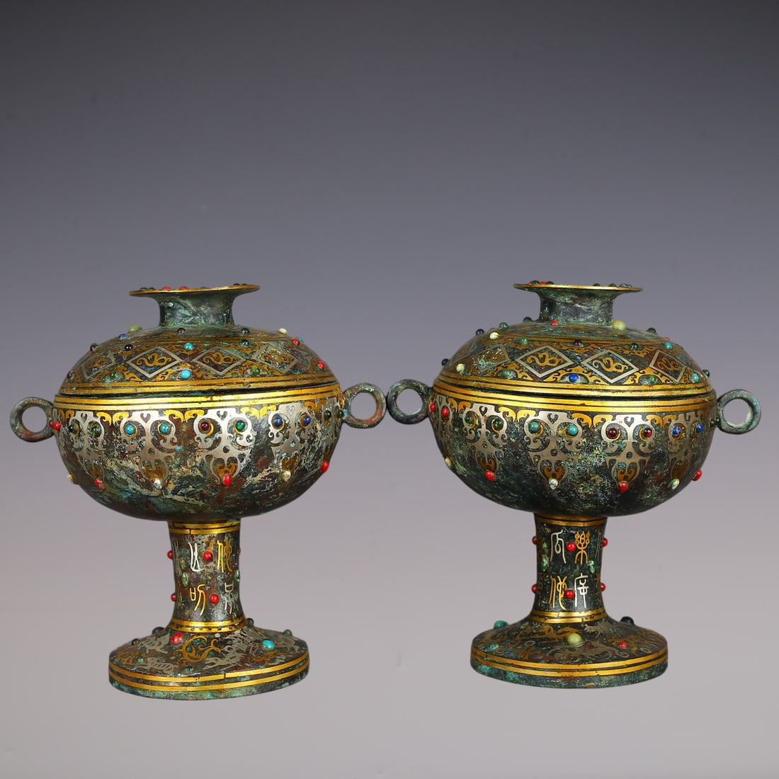 A Pair of Exquisite Bronze Inlaid Gold Inlaid Gems With Inscription Double-Ears Censer: A Pair of Exquisite Bronze Inlaid Gold Inlaid Gems With Inscription Double-Ears Censer Han Dynasty, China Size:8.7inx6.3inx9.1in